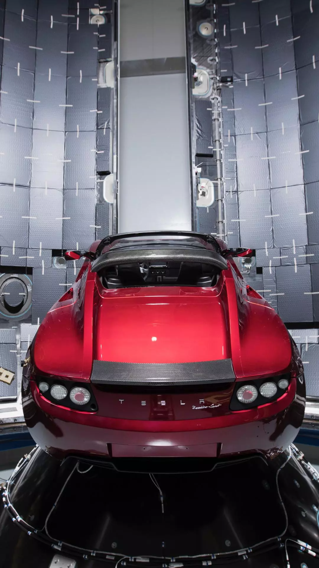 Rear View of Red Tesla Roadster Sport