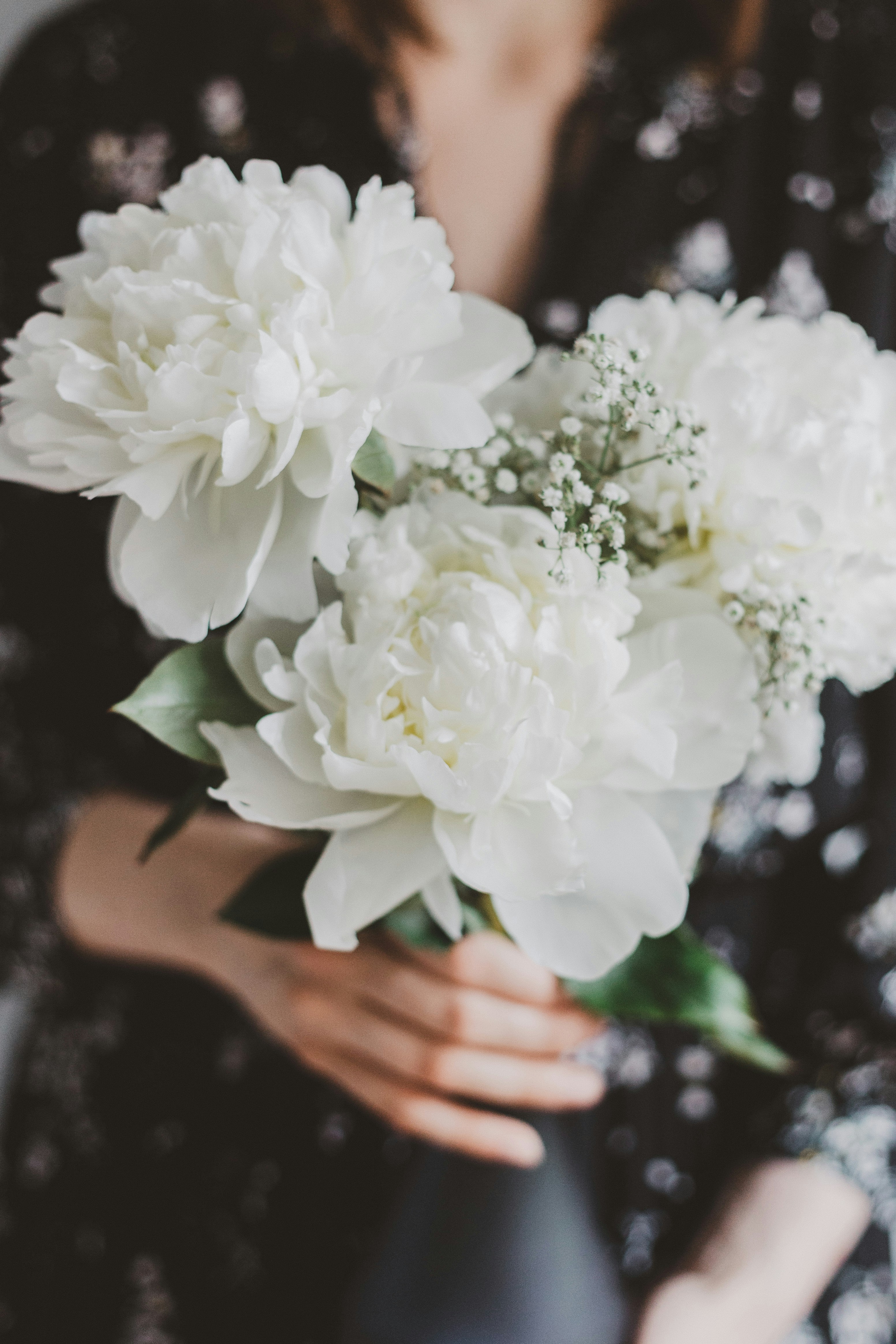 Woman Holding White Peony Bouquet