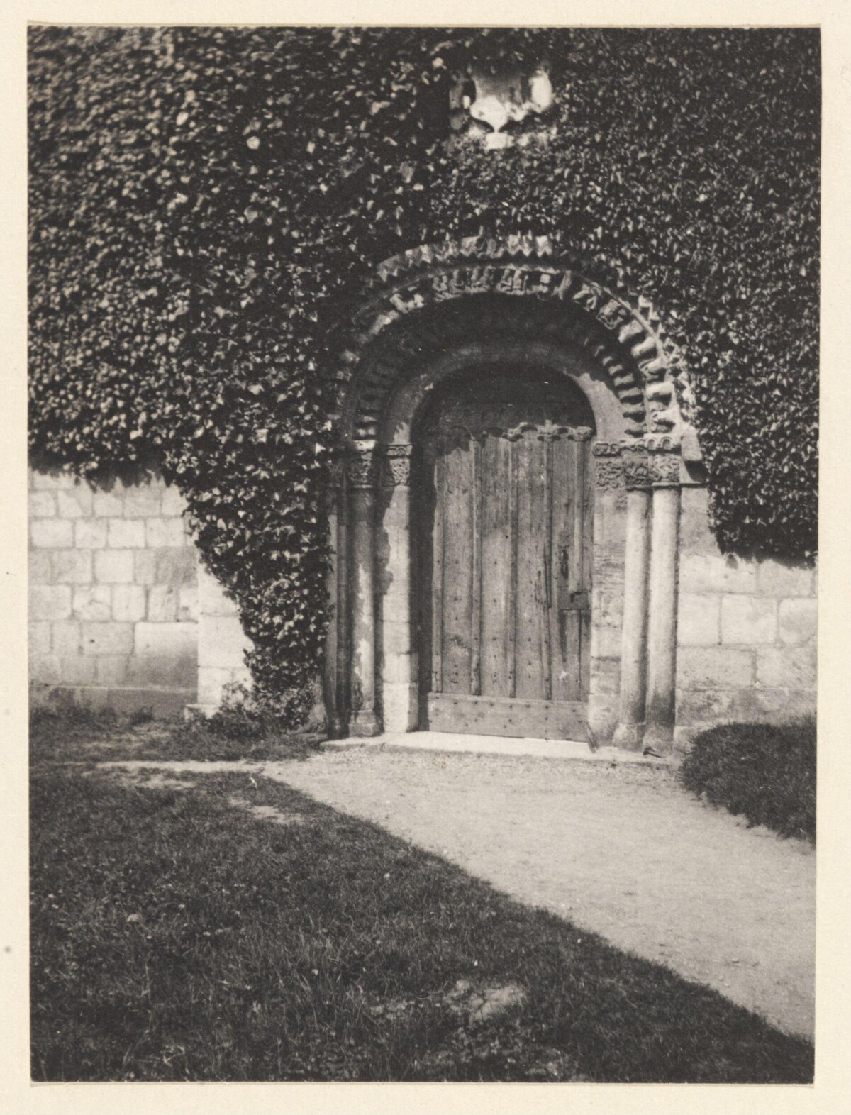Vintage Ivy-Covered Arched Doorway