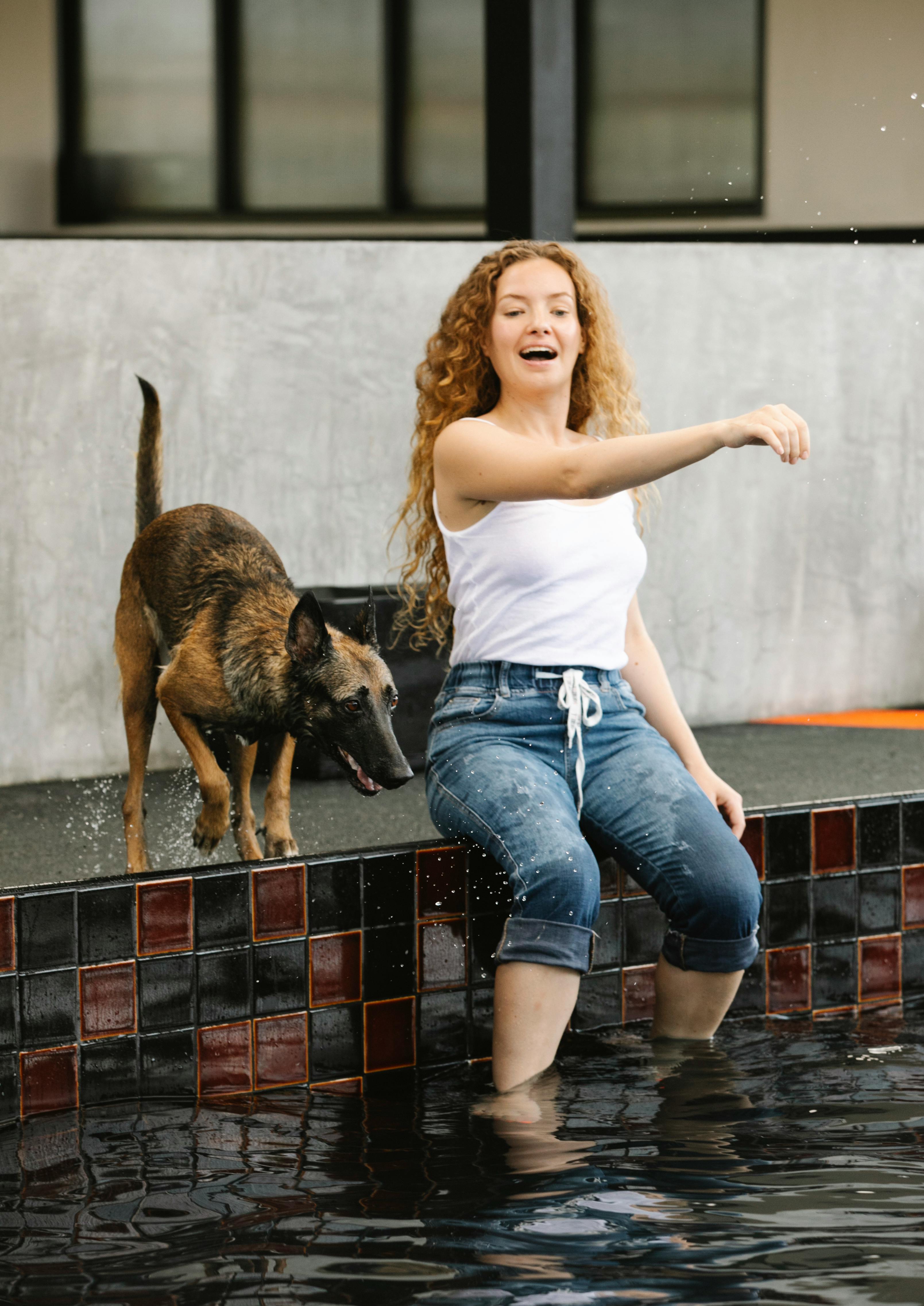 Woman And Dog At Poolside