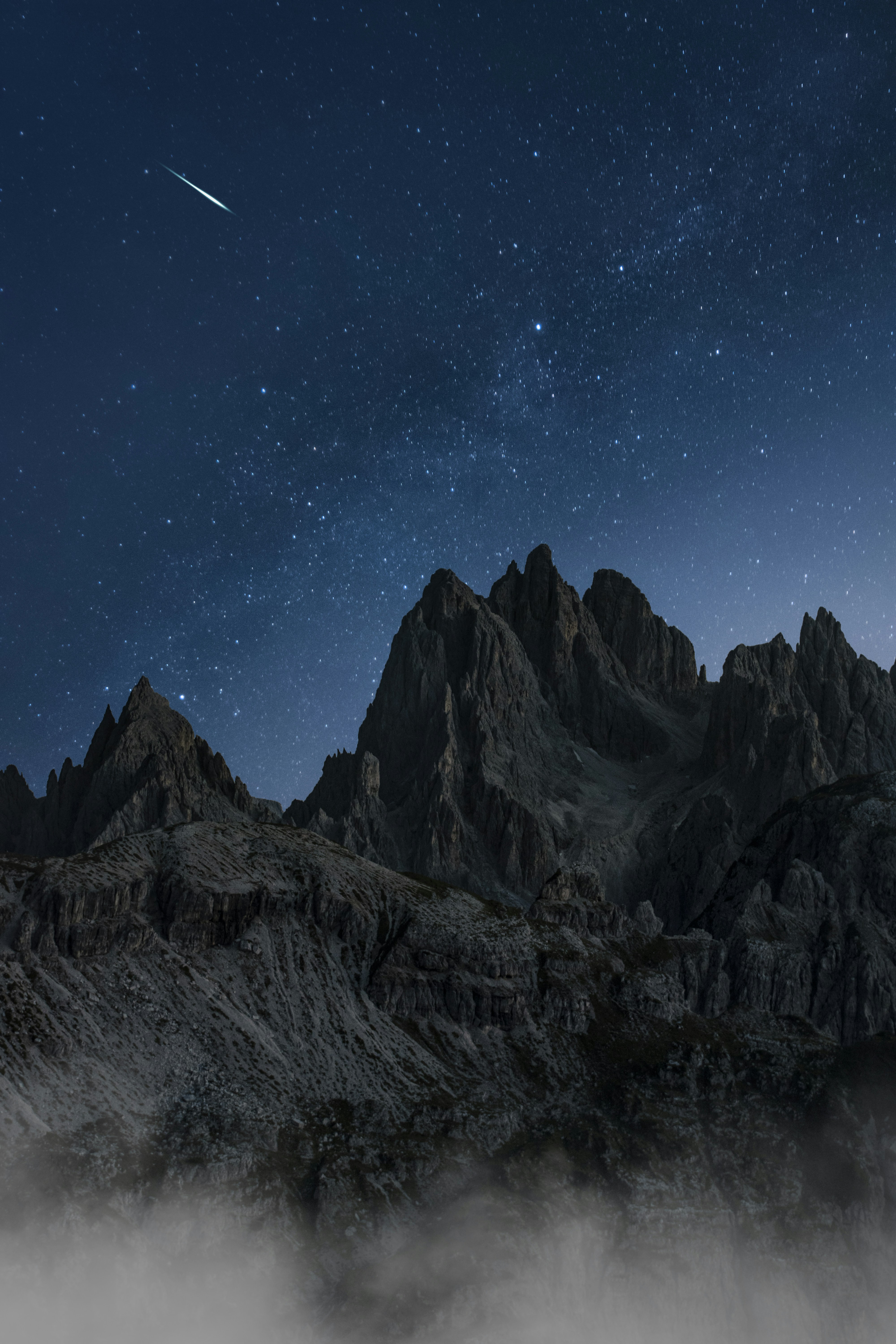 Meteor Over Starry Mountain Peaks