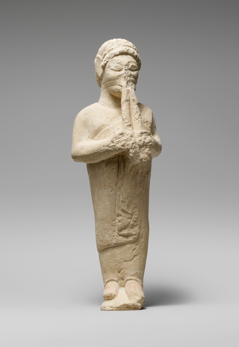 Ancient Stone Statue of a Piper
