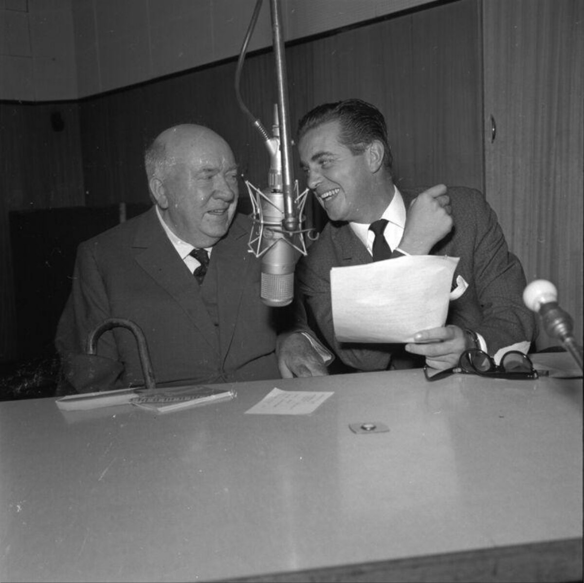 Two Men Recording In Radio Studio