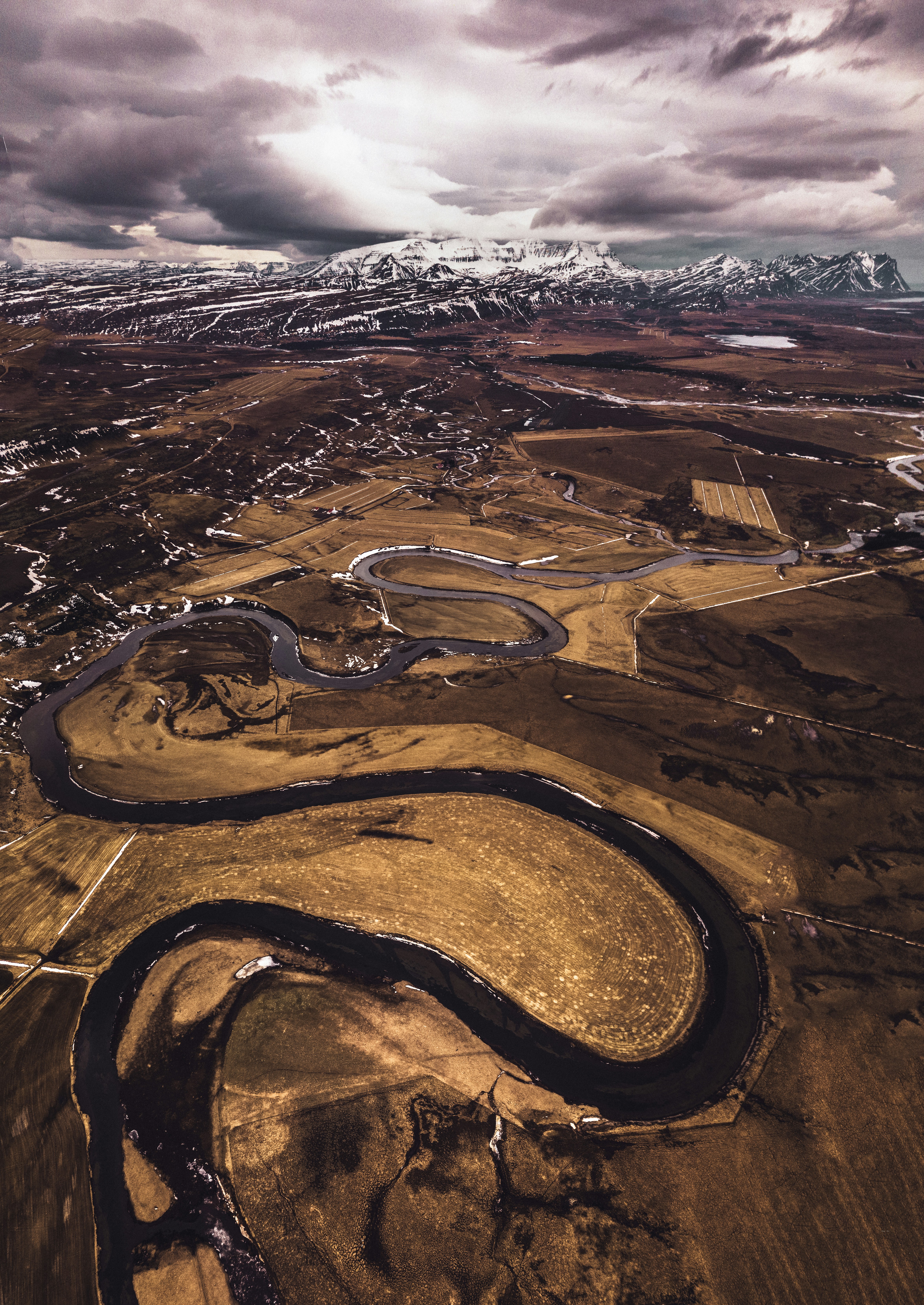 Aerial View of Winding River Landscape