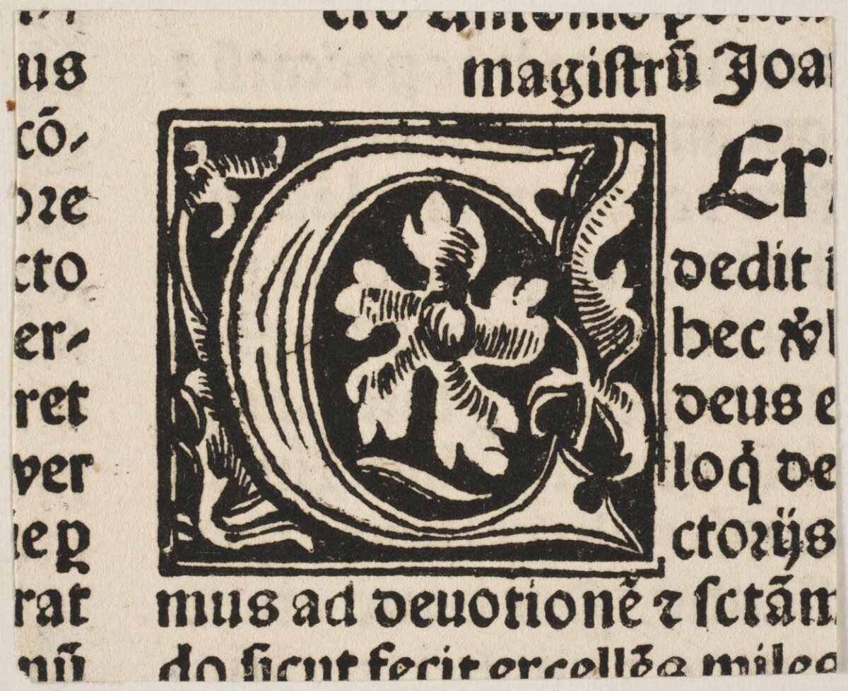Decorated Woodcut Initial C on Antique Print Page