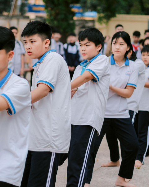 Students Doing Group Exercise at School