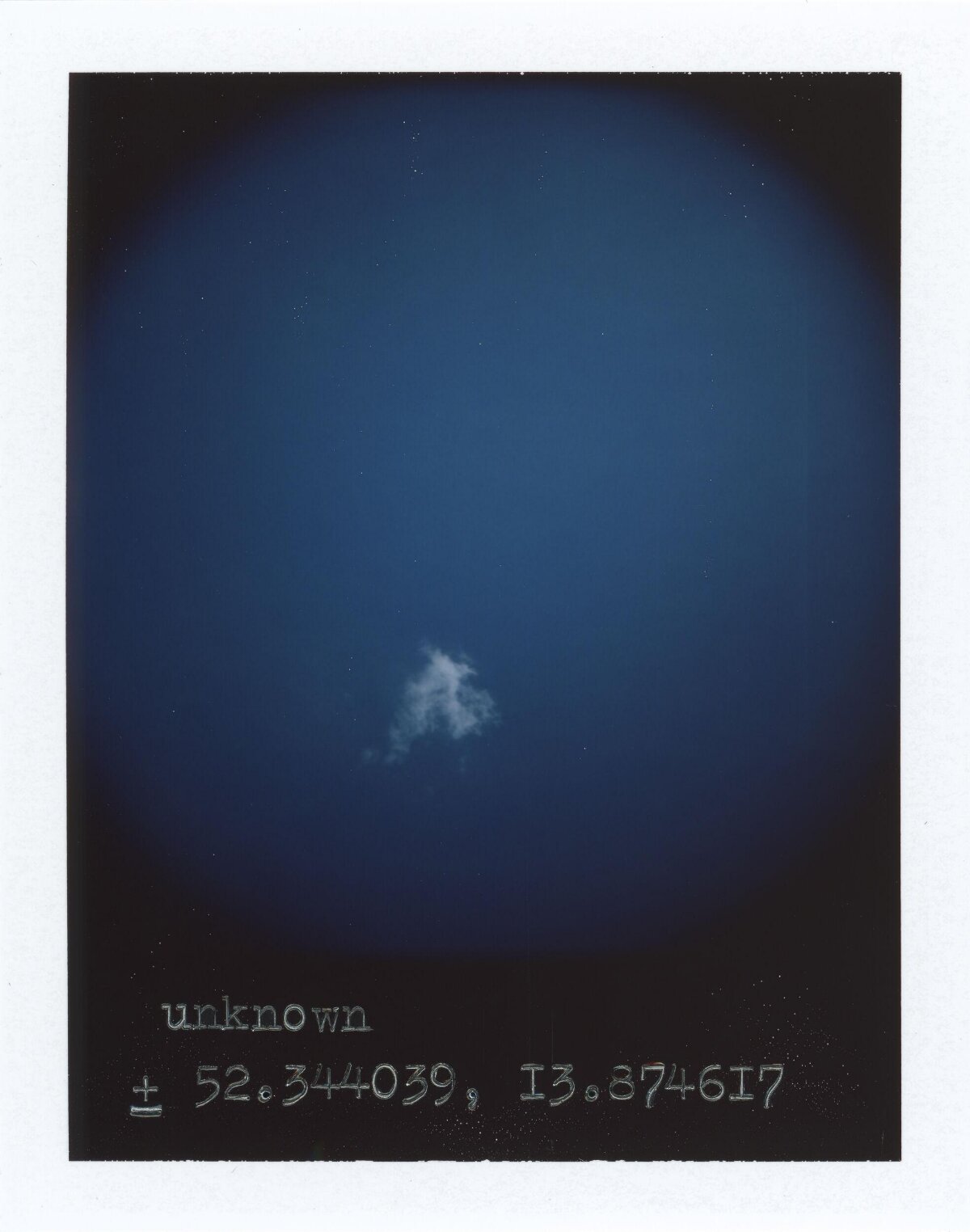 Lone Cloud on Deep Blue Night Sky