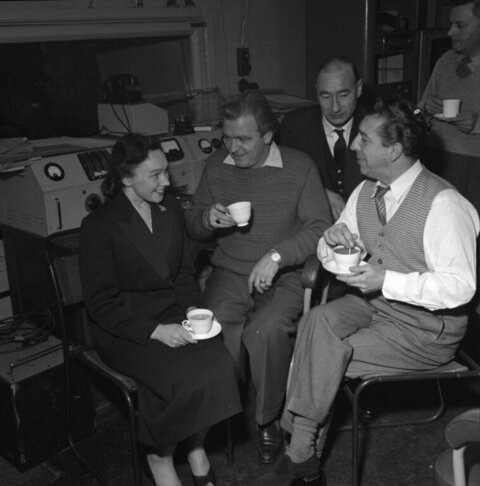 Colleagues Tea Break in Laboratory