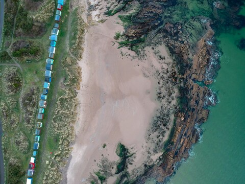 Aerial View of Coastal Beach Huts