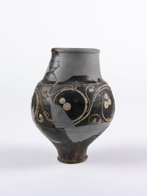 Restored Ancient Black Painted Pottery Jar
