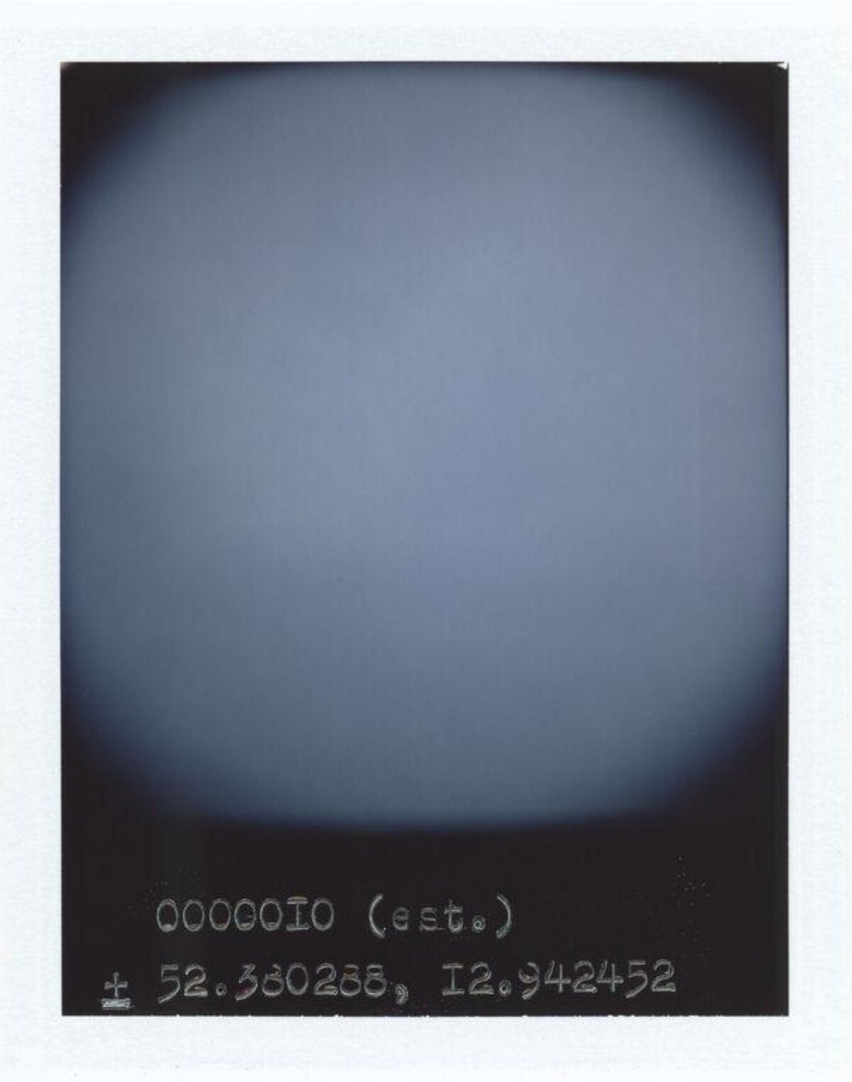 Polaroid With Handwritten Coordinates