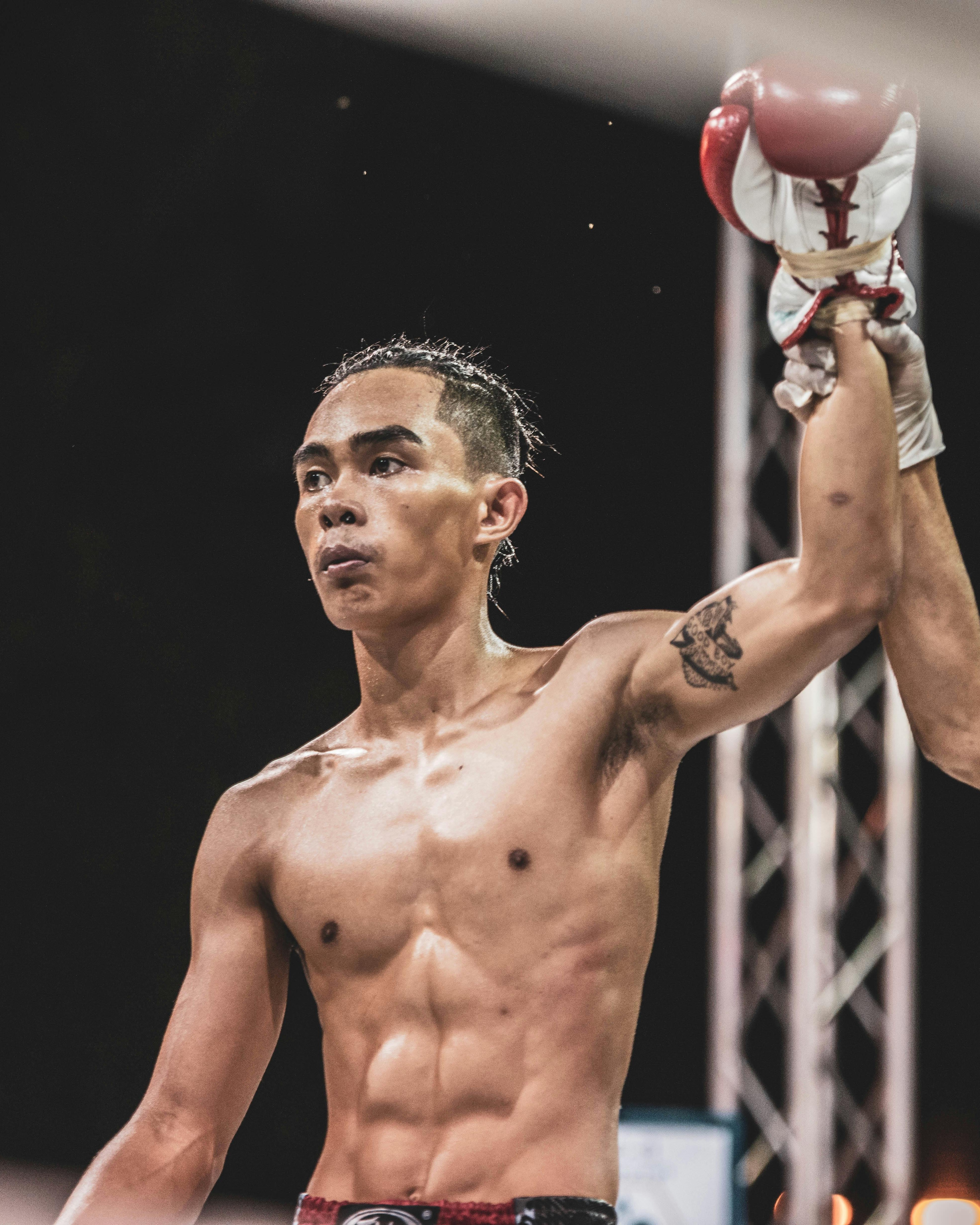 Victorious Boxer With Raised Arm