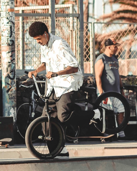 BMX Rider Performing Trick at Skatepark
