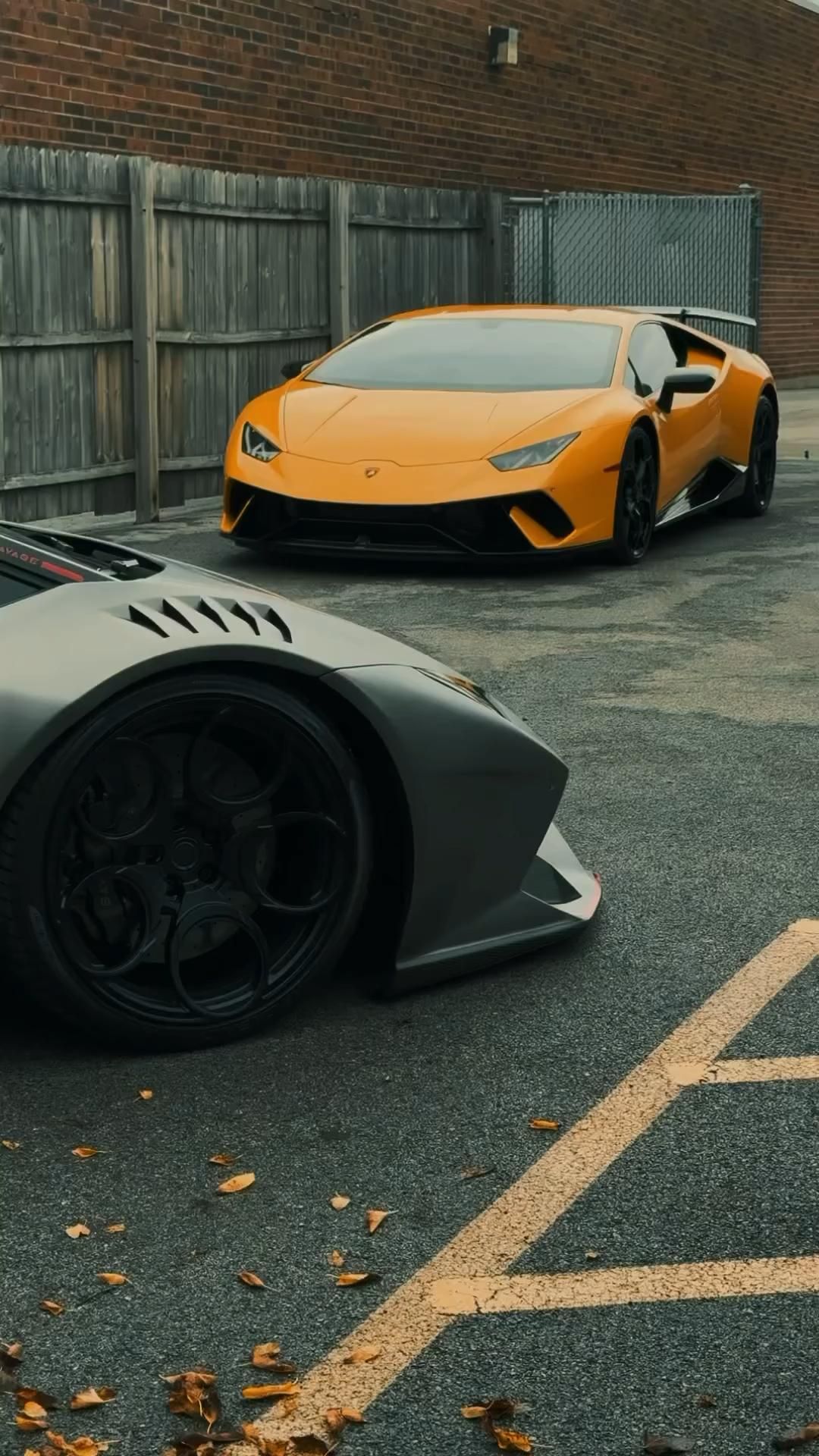 Two Lamborghini Supercars in Parking Lot