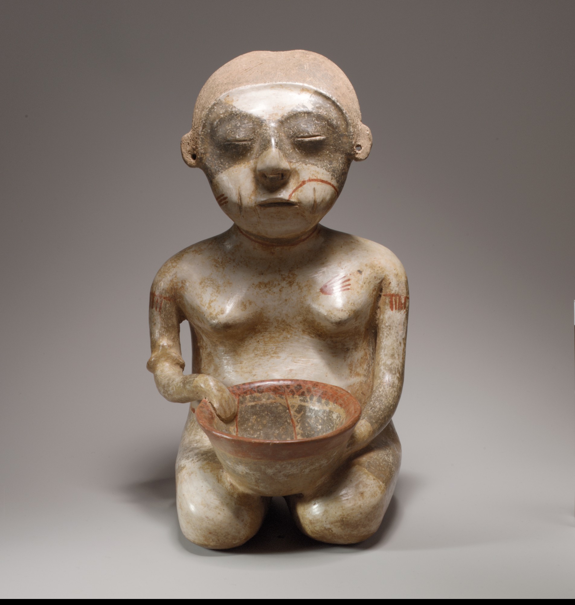 Ancient Seated Female Ceramic Figurine
