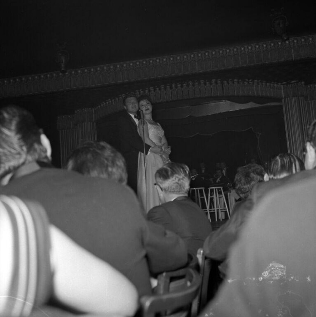 Couple Performing On Stage For Audience