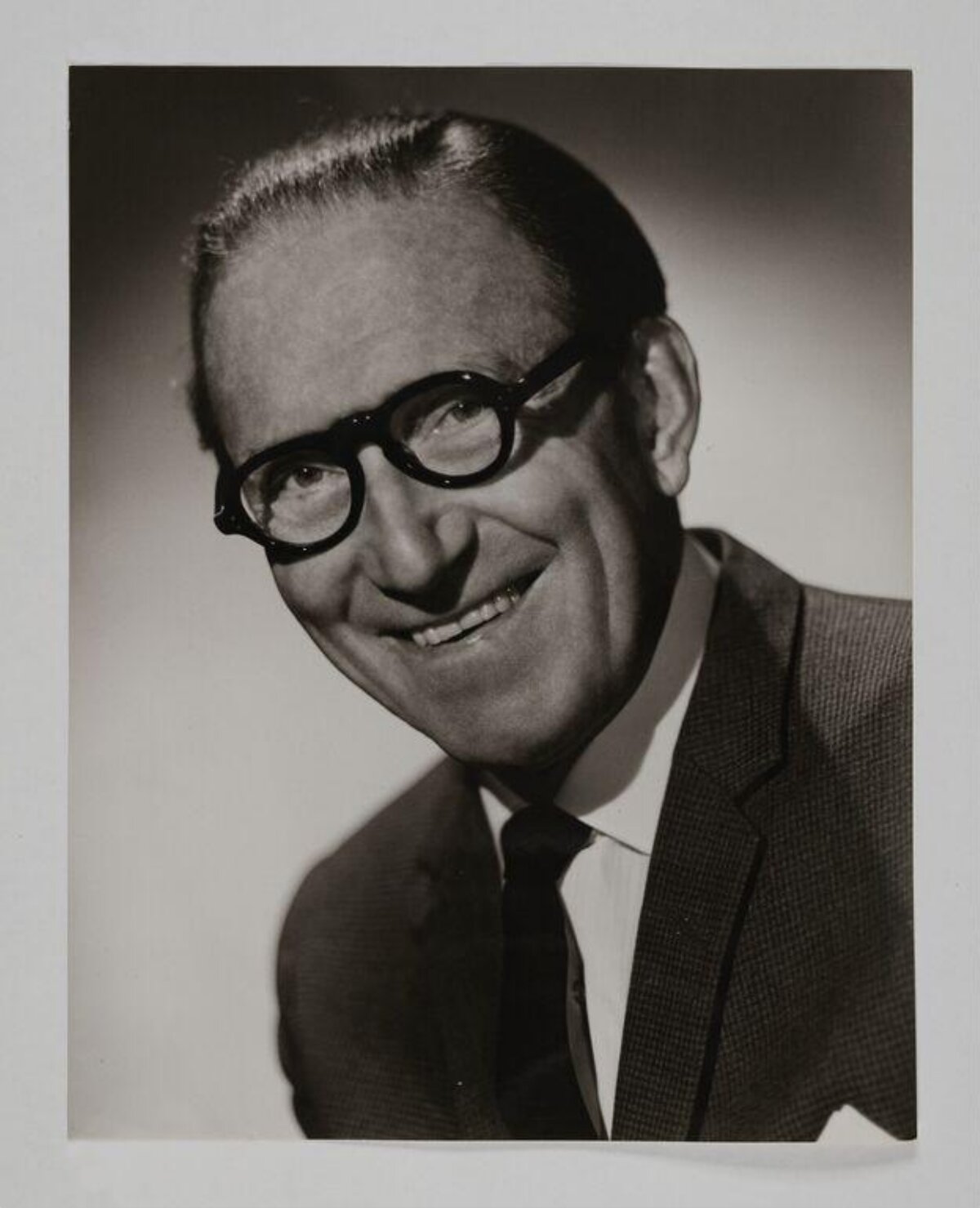 Black and White Portrait of Smiling Man