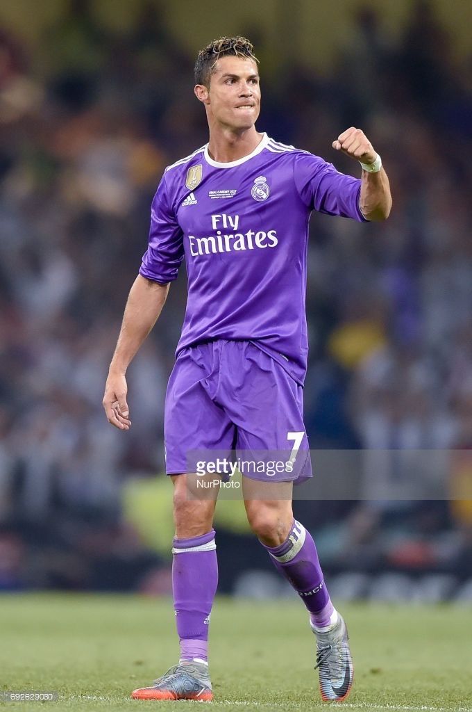 Cristiano Ronaldo celebrates in Real Madrid purple kit