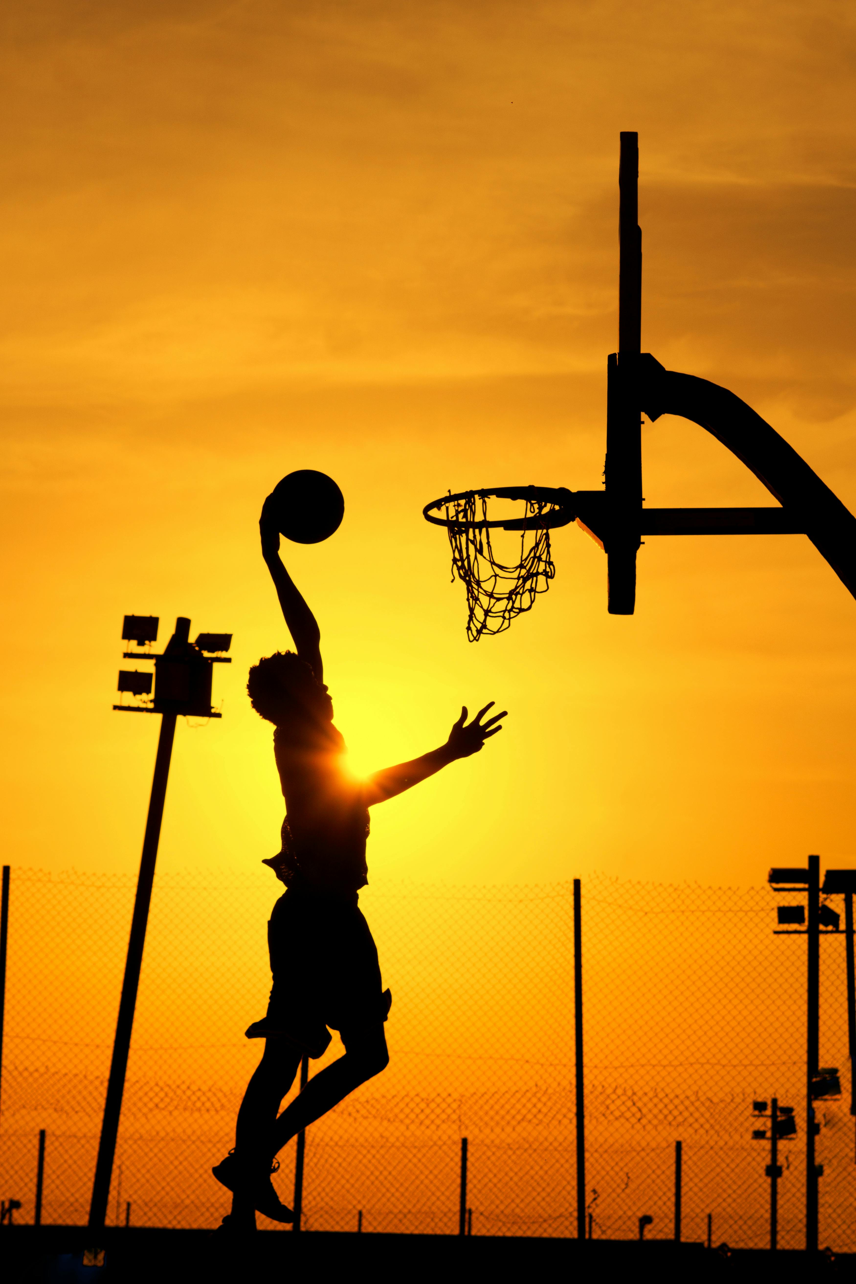 Basketball Dunk Silhouette at Sunset