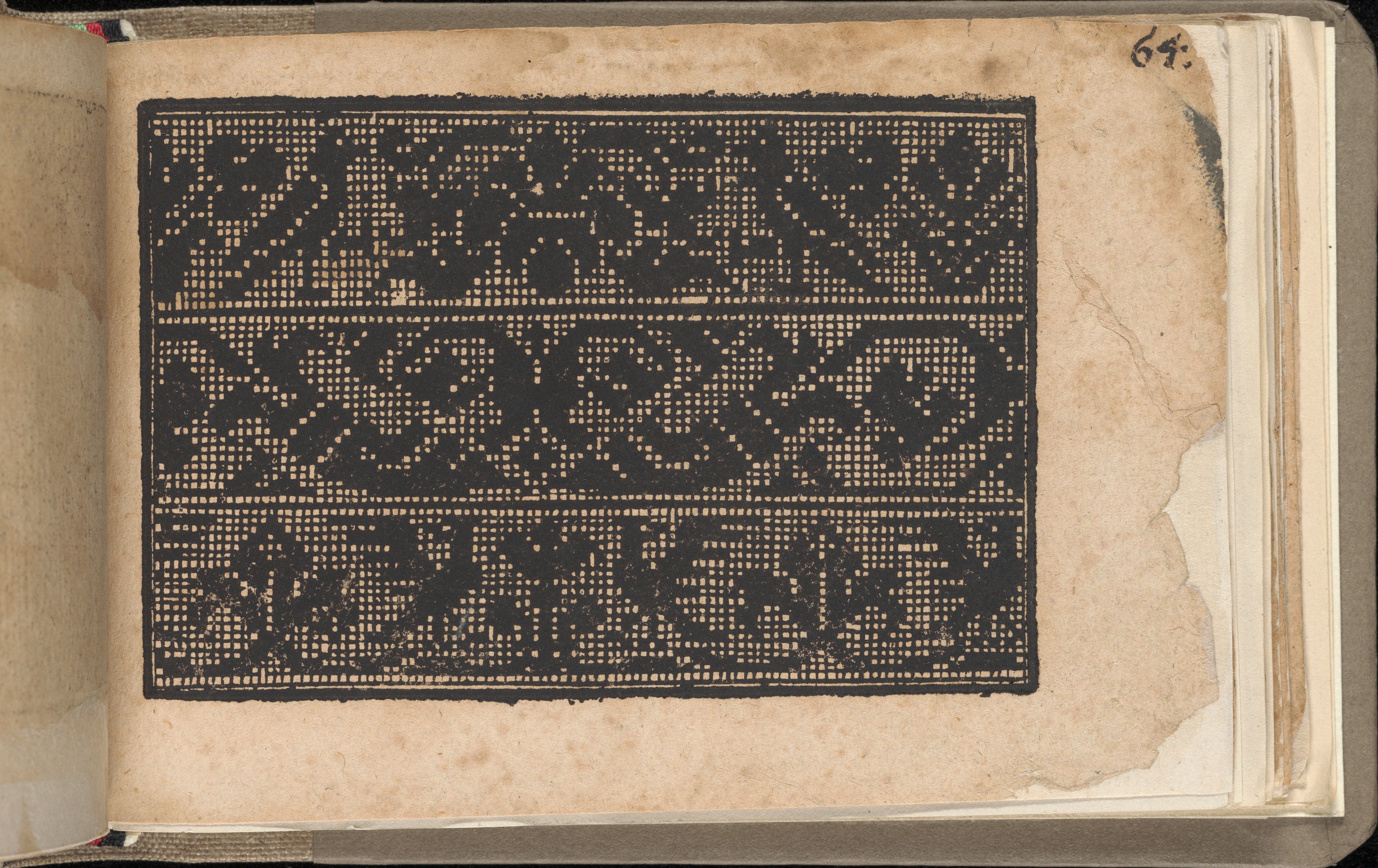 Geometric Lace Pattern on Antique Book Page