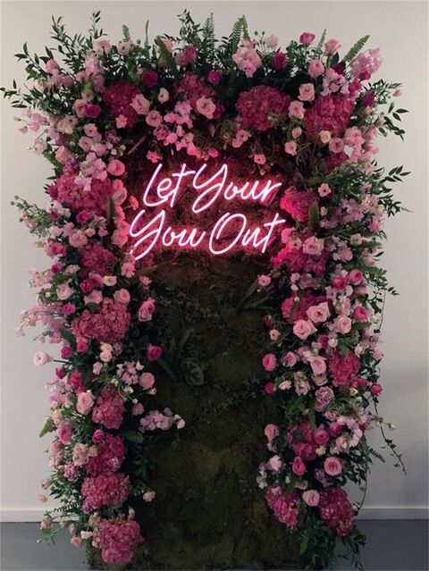 Pink Flower Arch With Neon Sign