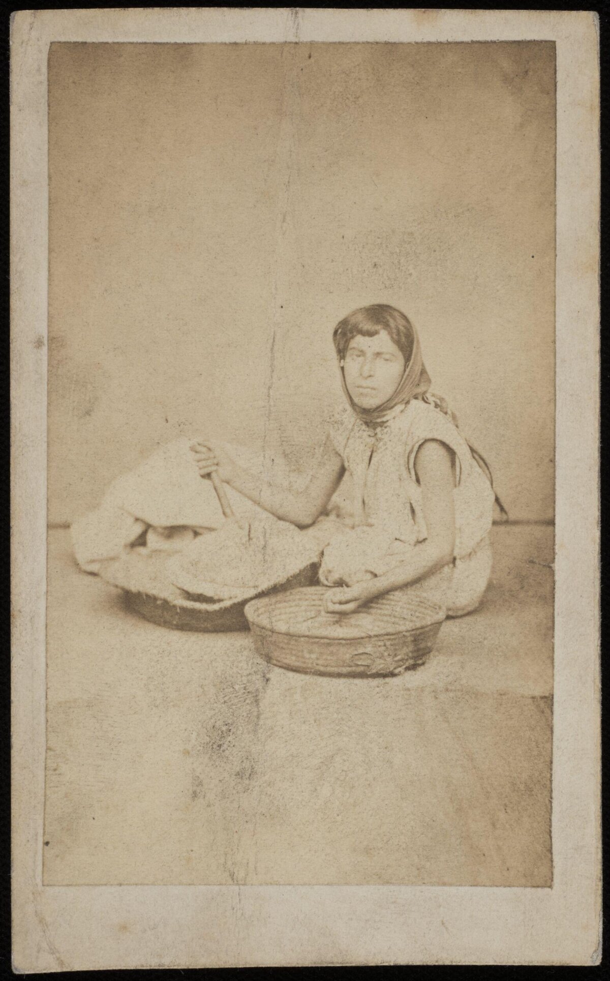 Vintage Photo of Woman Preparing Grain