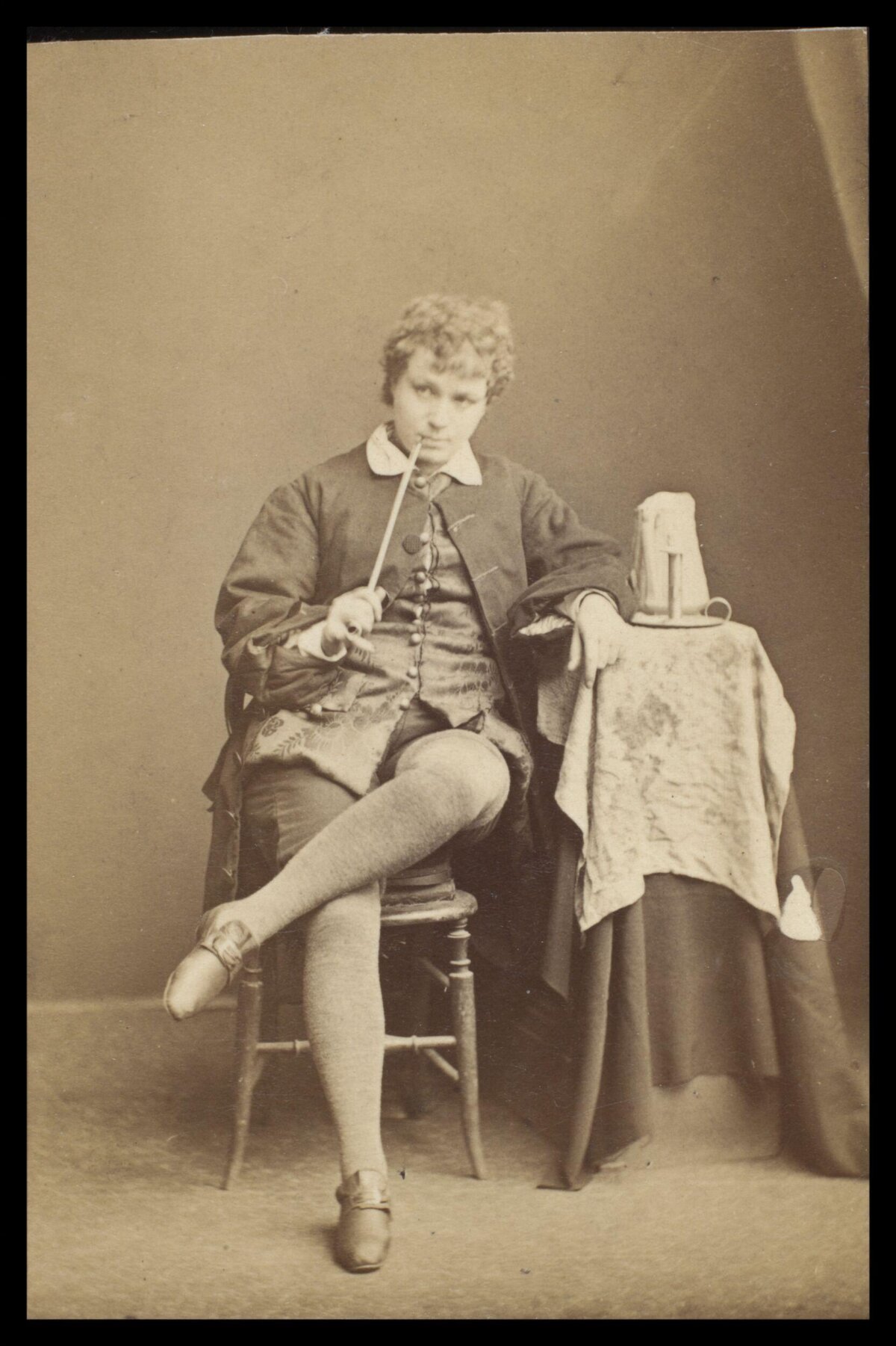 Vintage Portrait of Seated Person with Pipe