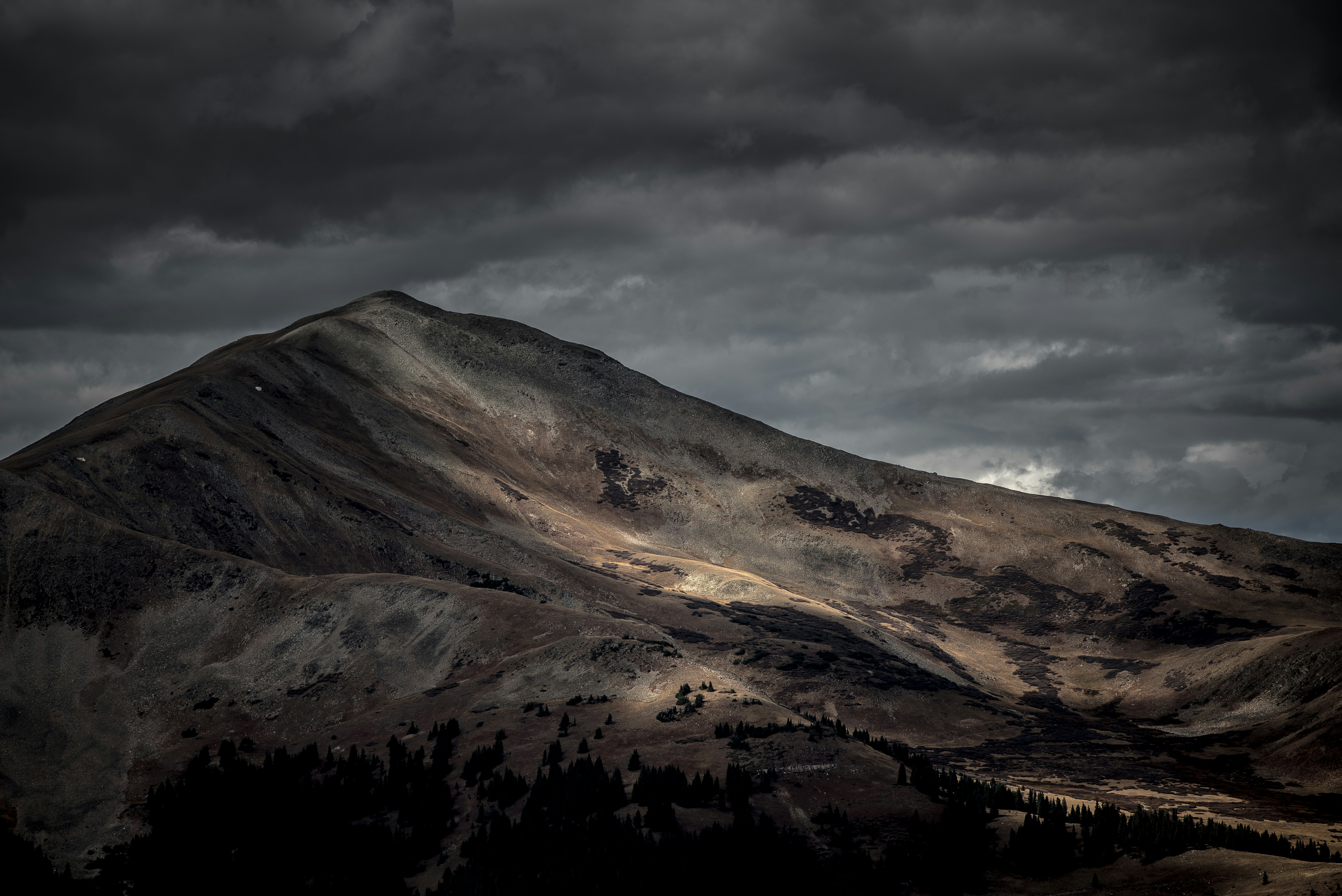 Storm Clouds Over Mountain Peak