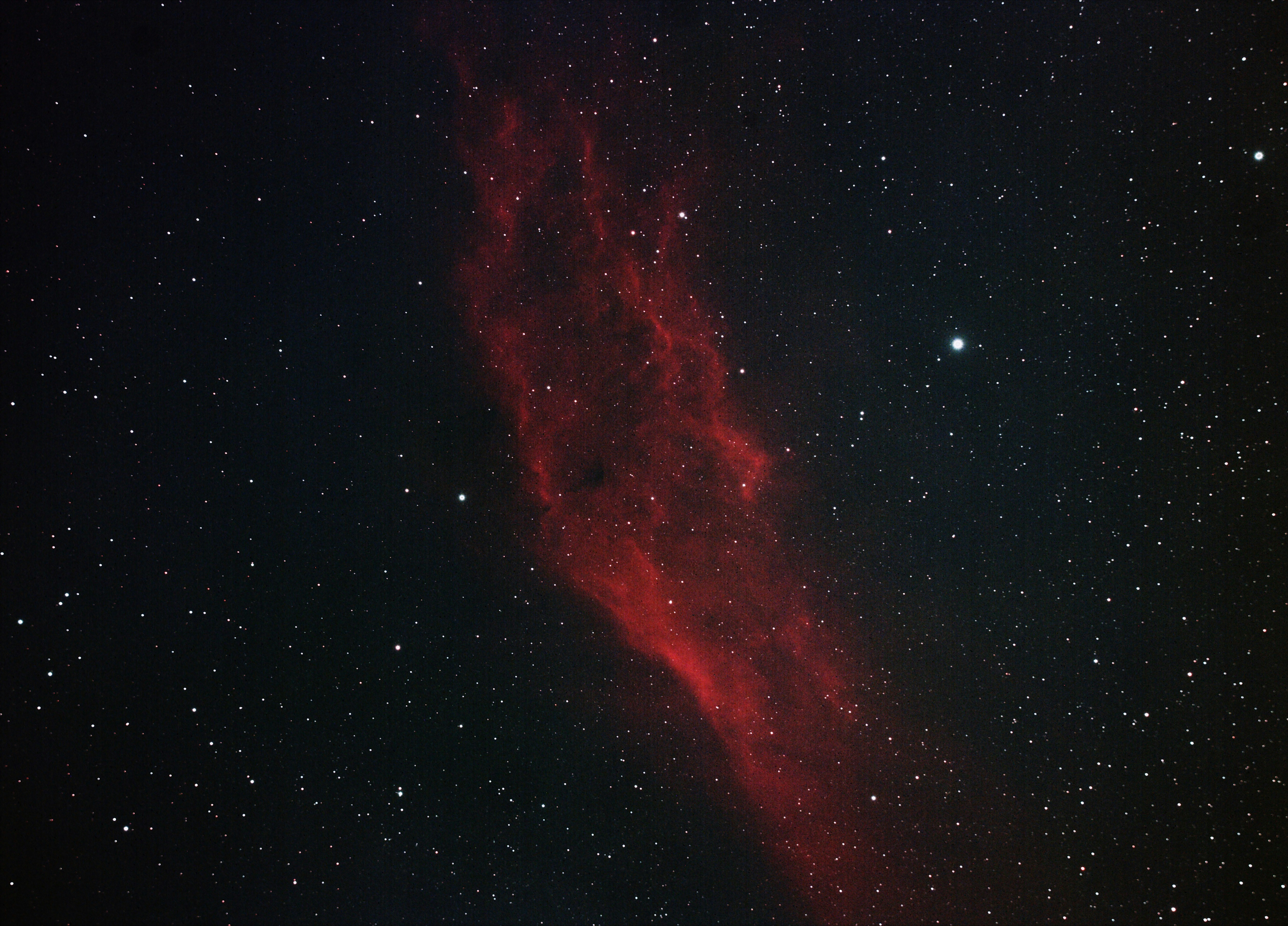 Red Emission Nebula in Space