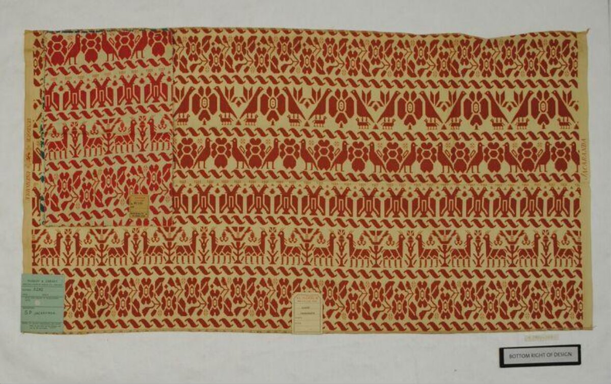 Red Geometric Animal Pattern Textile Sample
