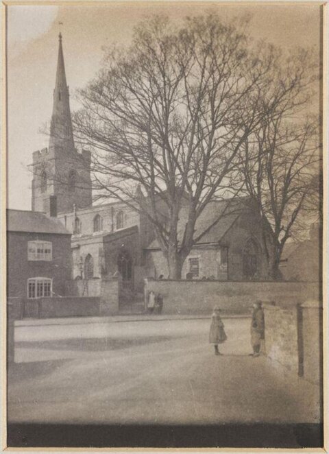 Vintage Street Scene with Stone Church