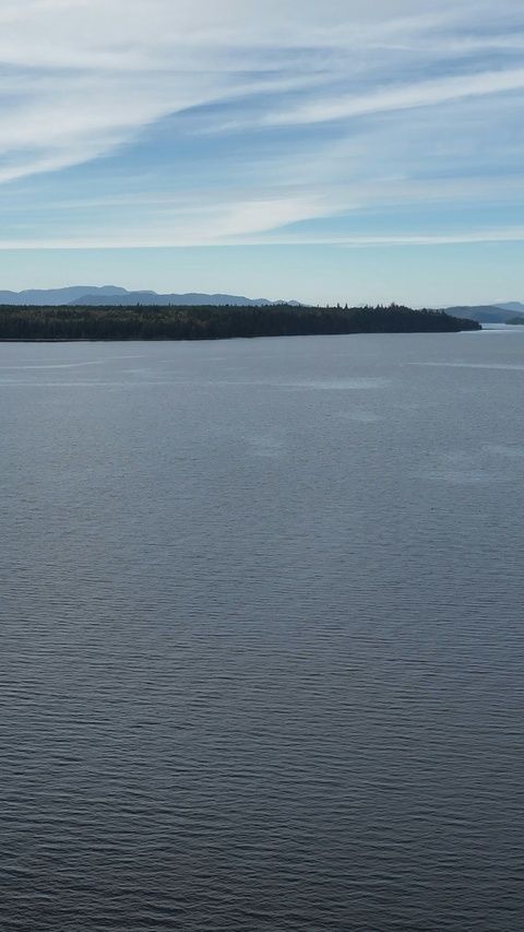 Calm Lake View with Distant Mountains