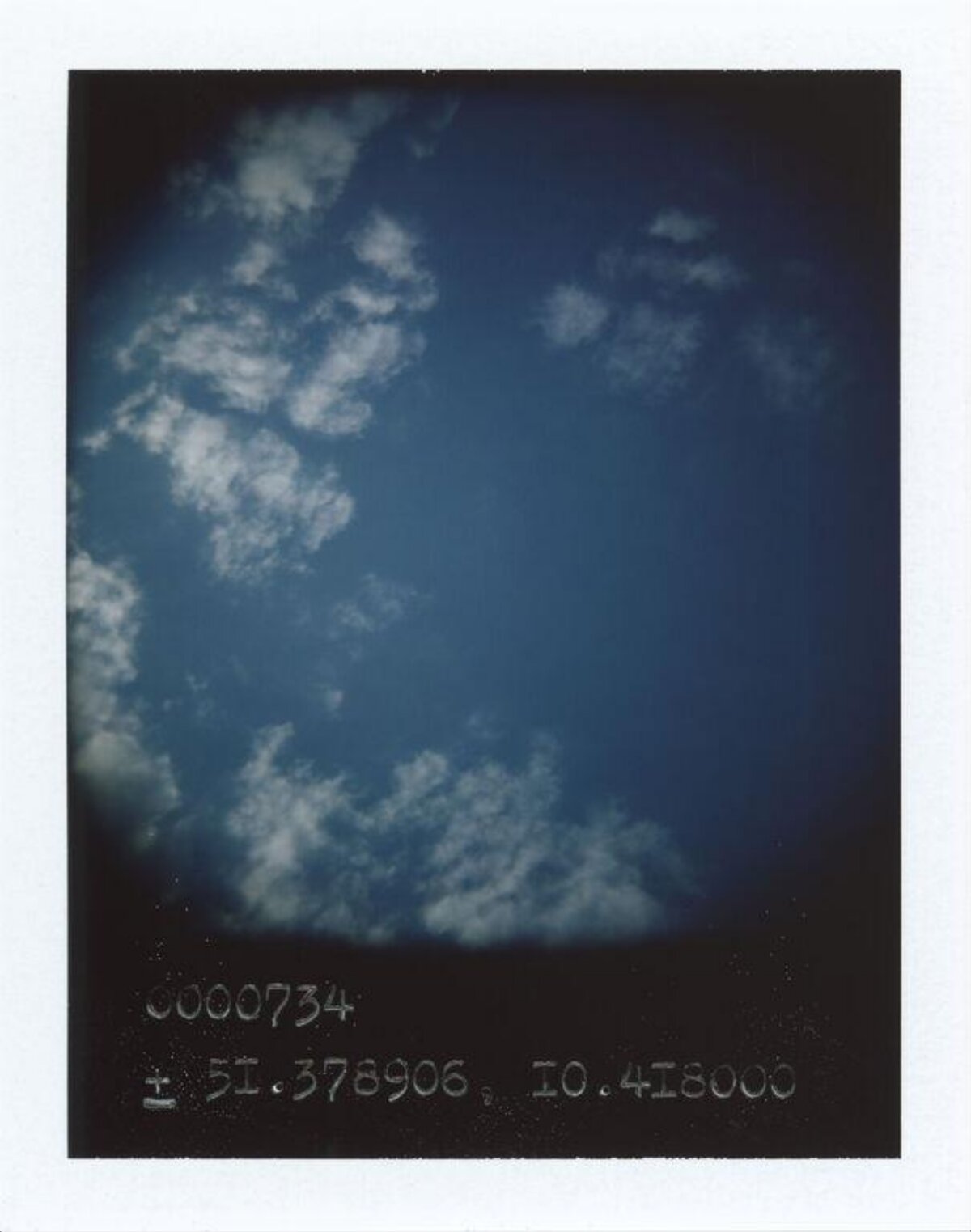Polaroid Shot of Blue Sky and Clouds
