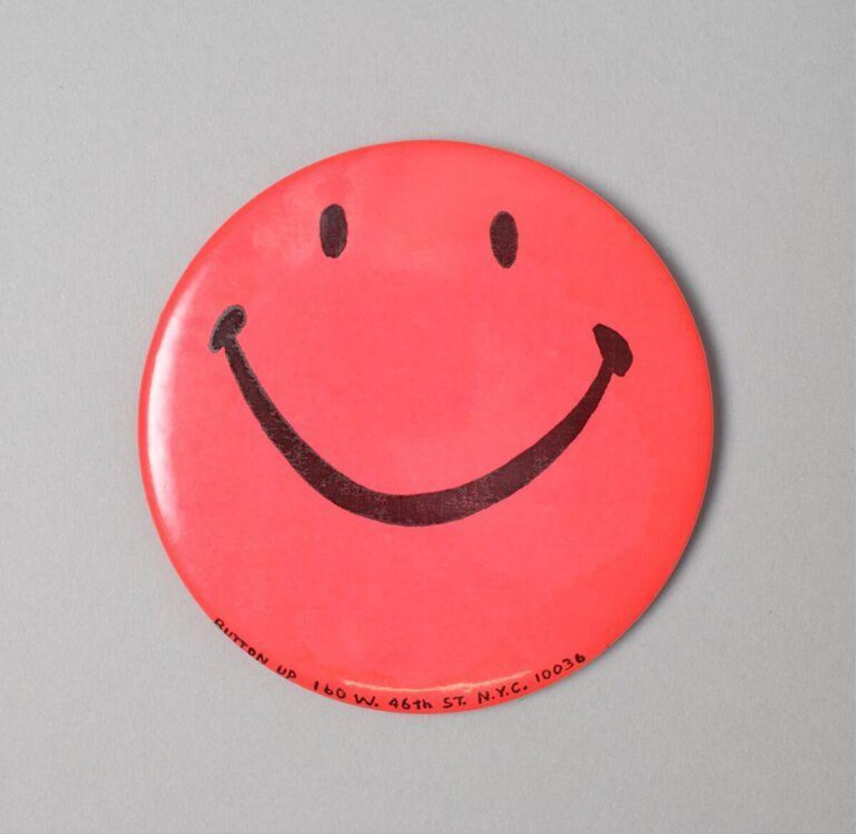 Red Smiley Face Pin Badge