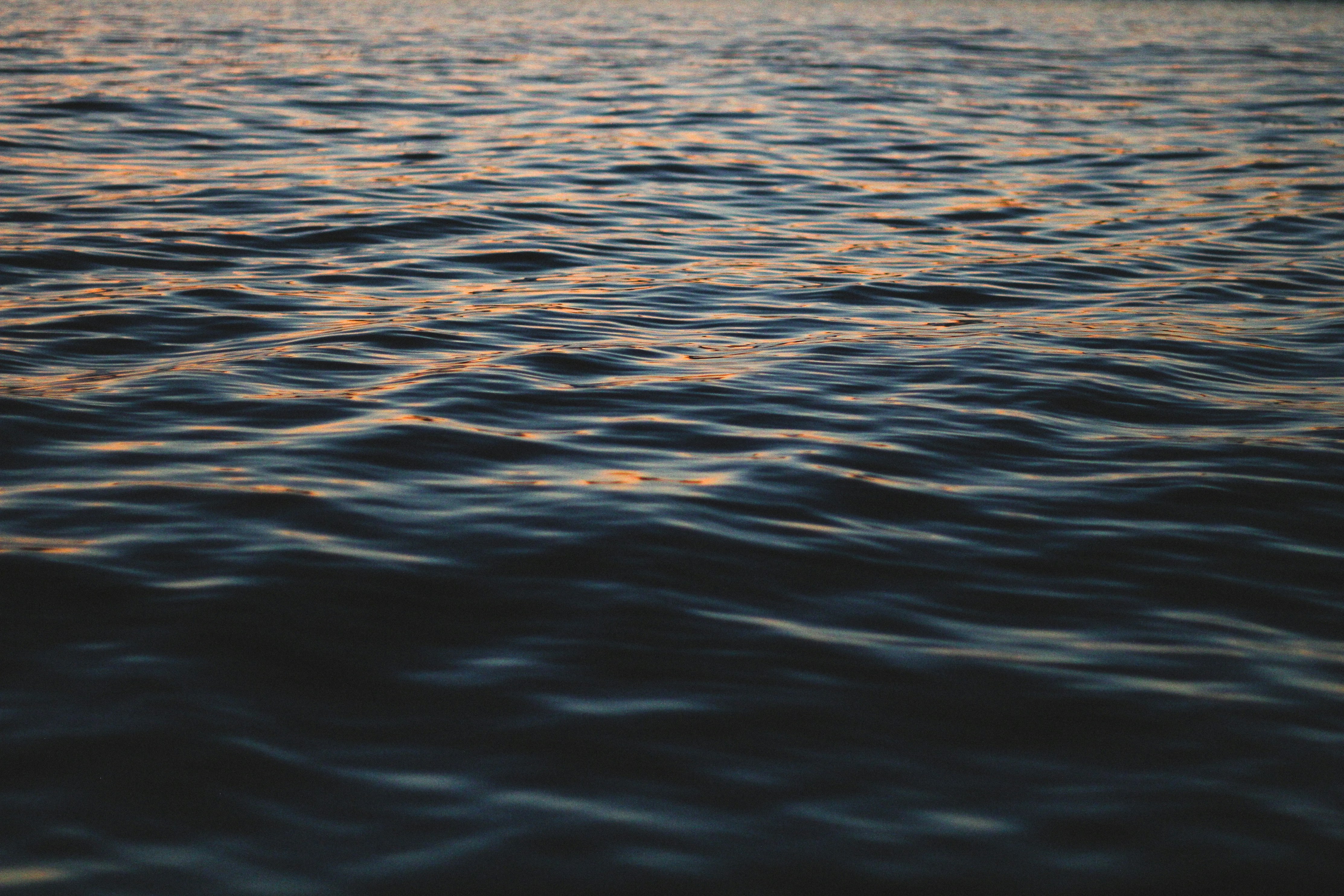 Sunset Glow on Water Surface — Scenery