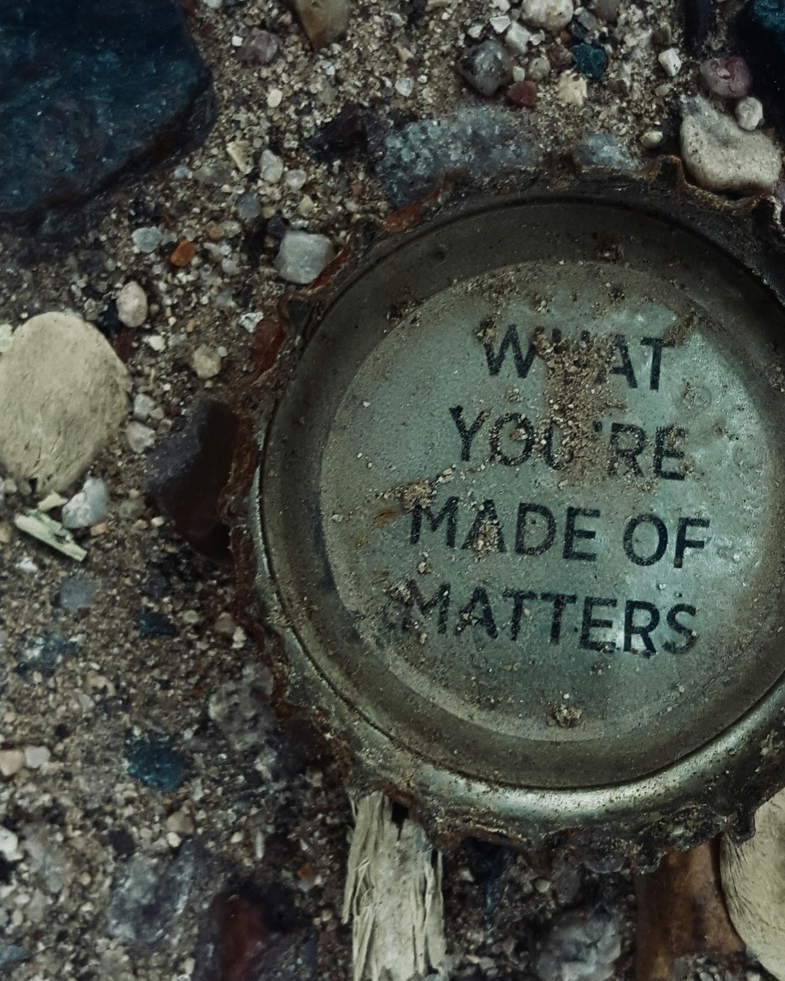 Dirty Bottle Cap With Motivational Text