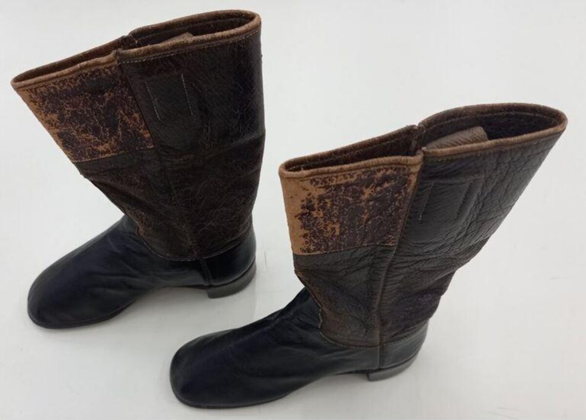 Pair of Distressed Brown Leather Boots