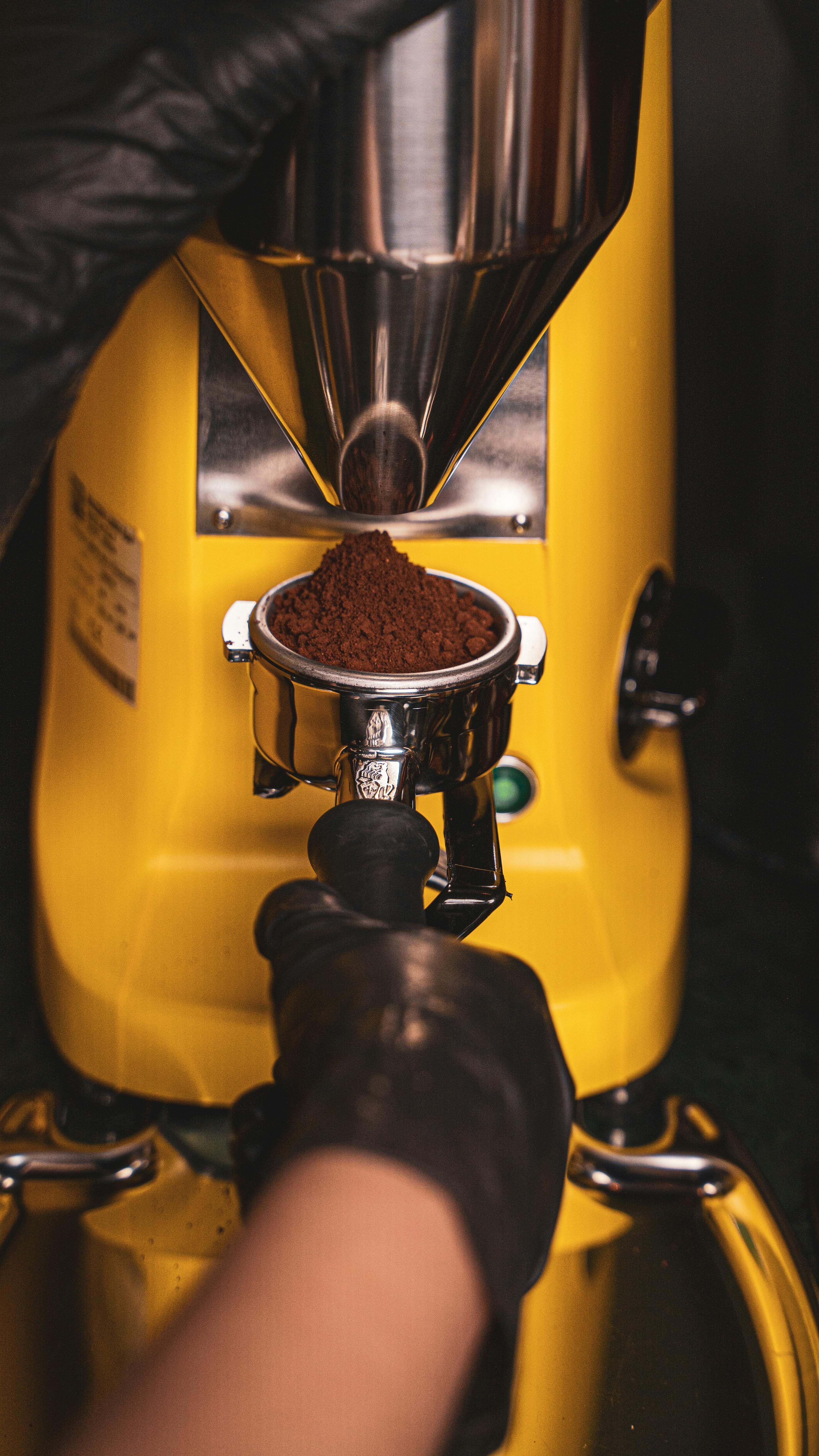 Dosing Ground Coffee into Espresso Portafilter