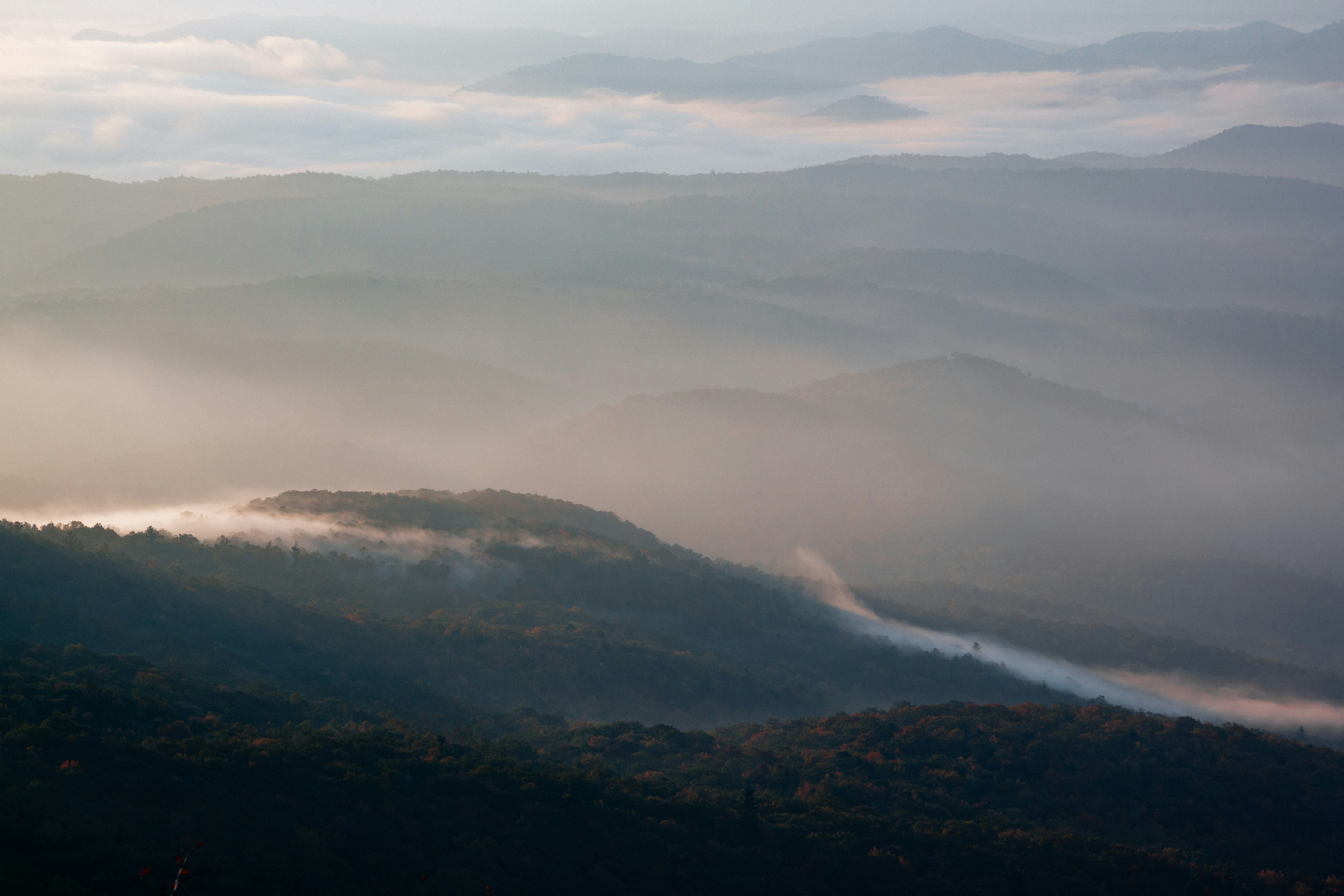 Layered Mountains in Morning Fog