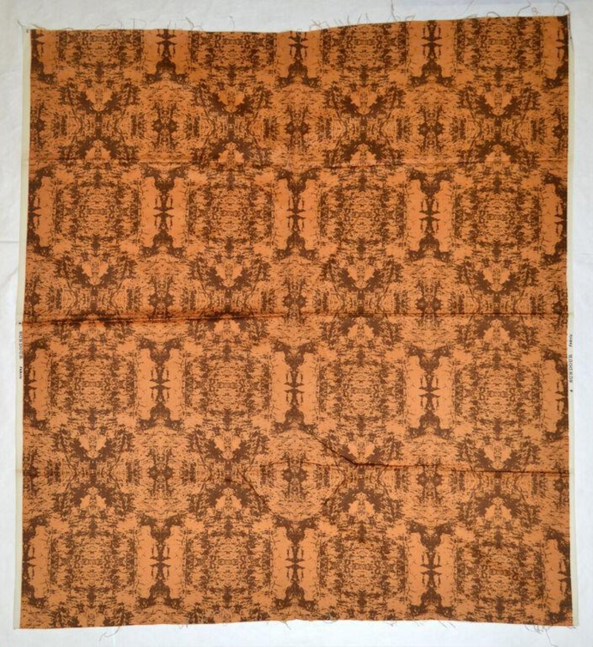 Orange Brown Symmetrical Patterned Fabric