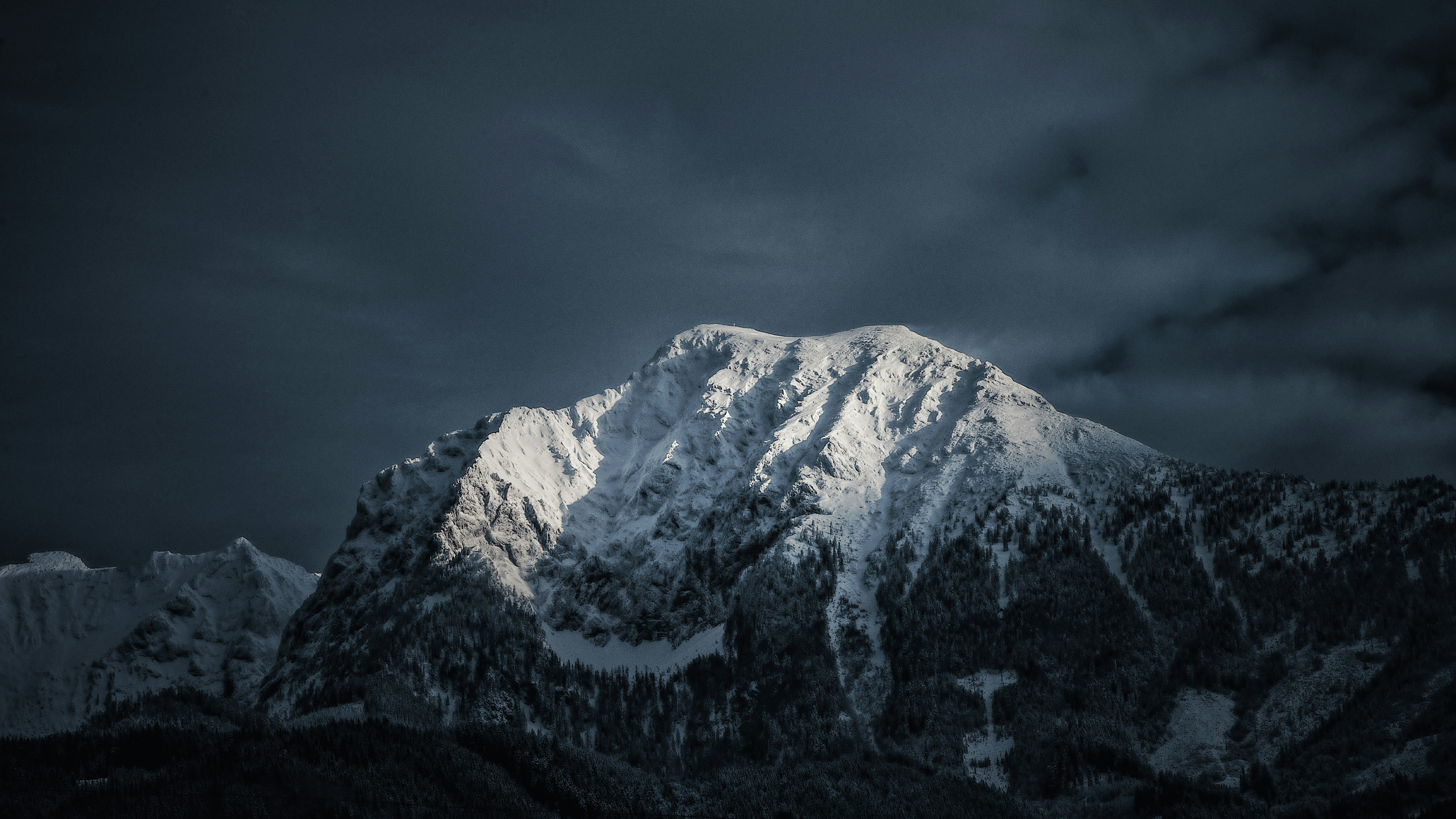 Snow-capped Mountain Under Dark Sky