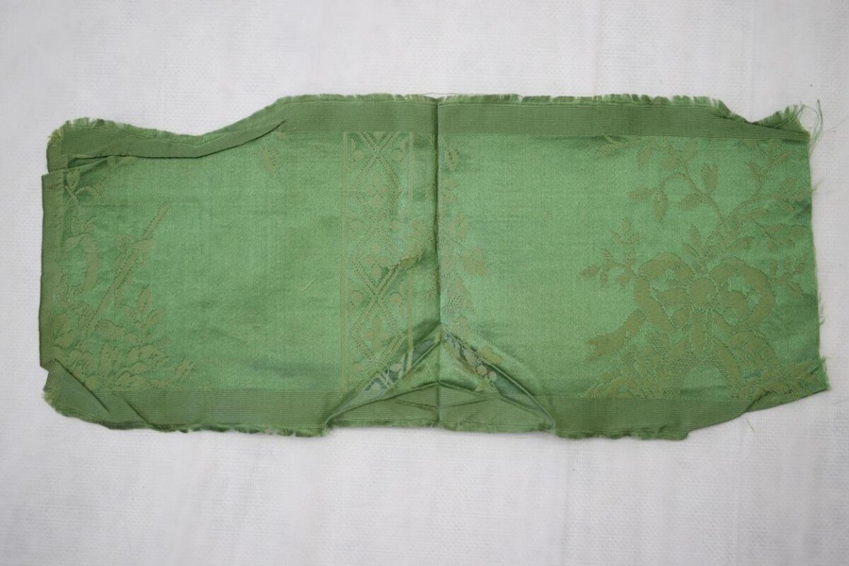 Folded Green Jacquard Fabric Swatch