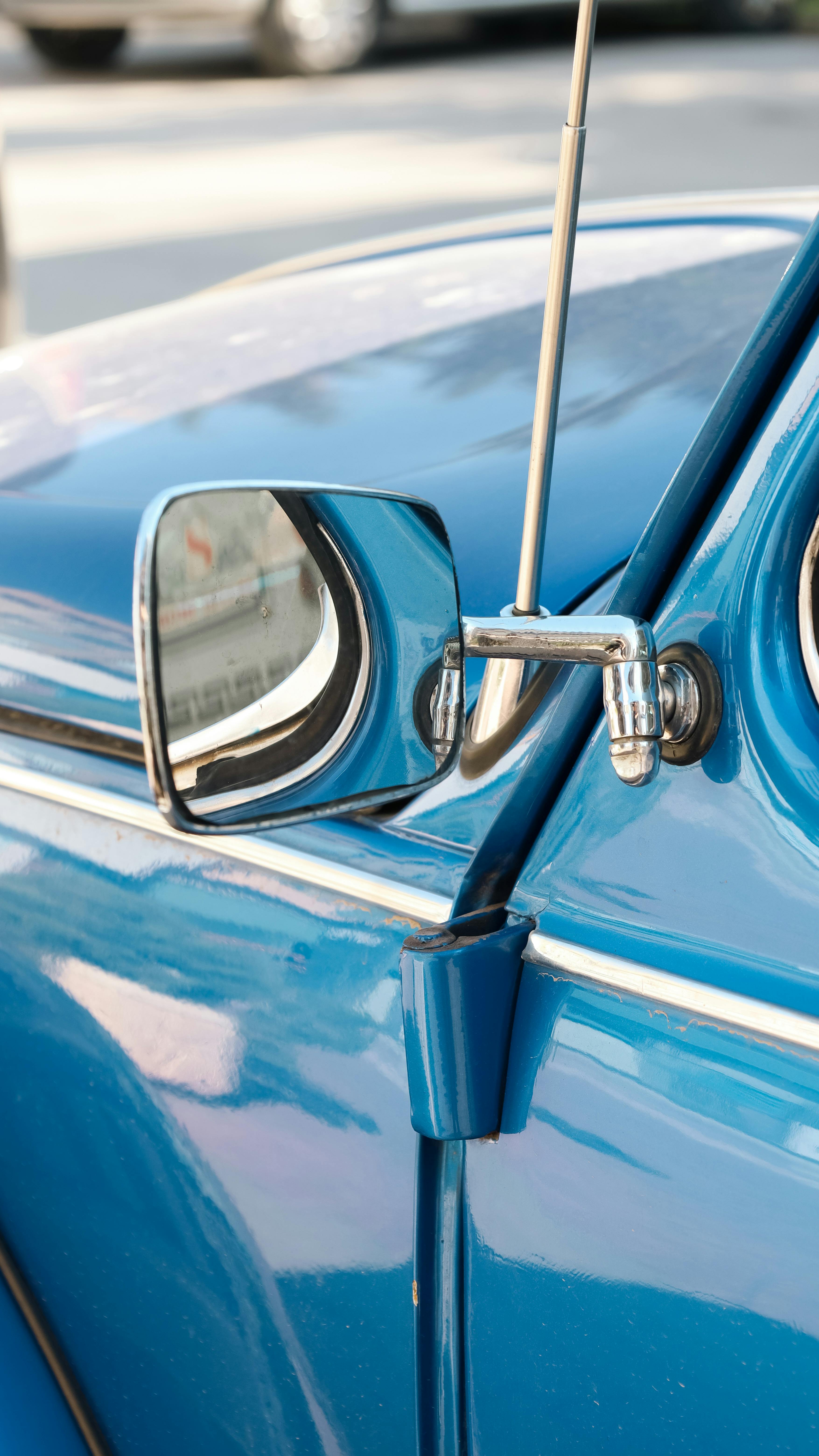 Close Up of Blue Classic Car Side Mirror