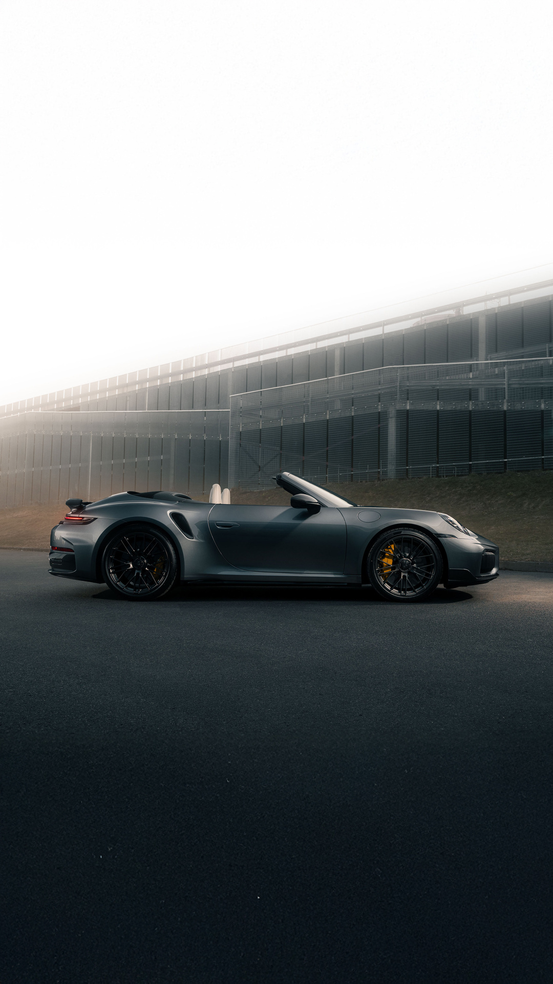 Gray Convertible Sports Car on Racetrack