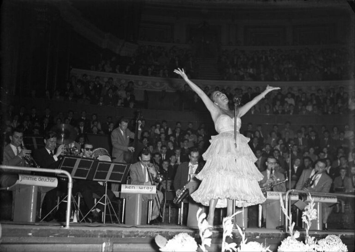 Female Singer Performing with Big Band