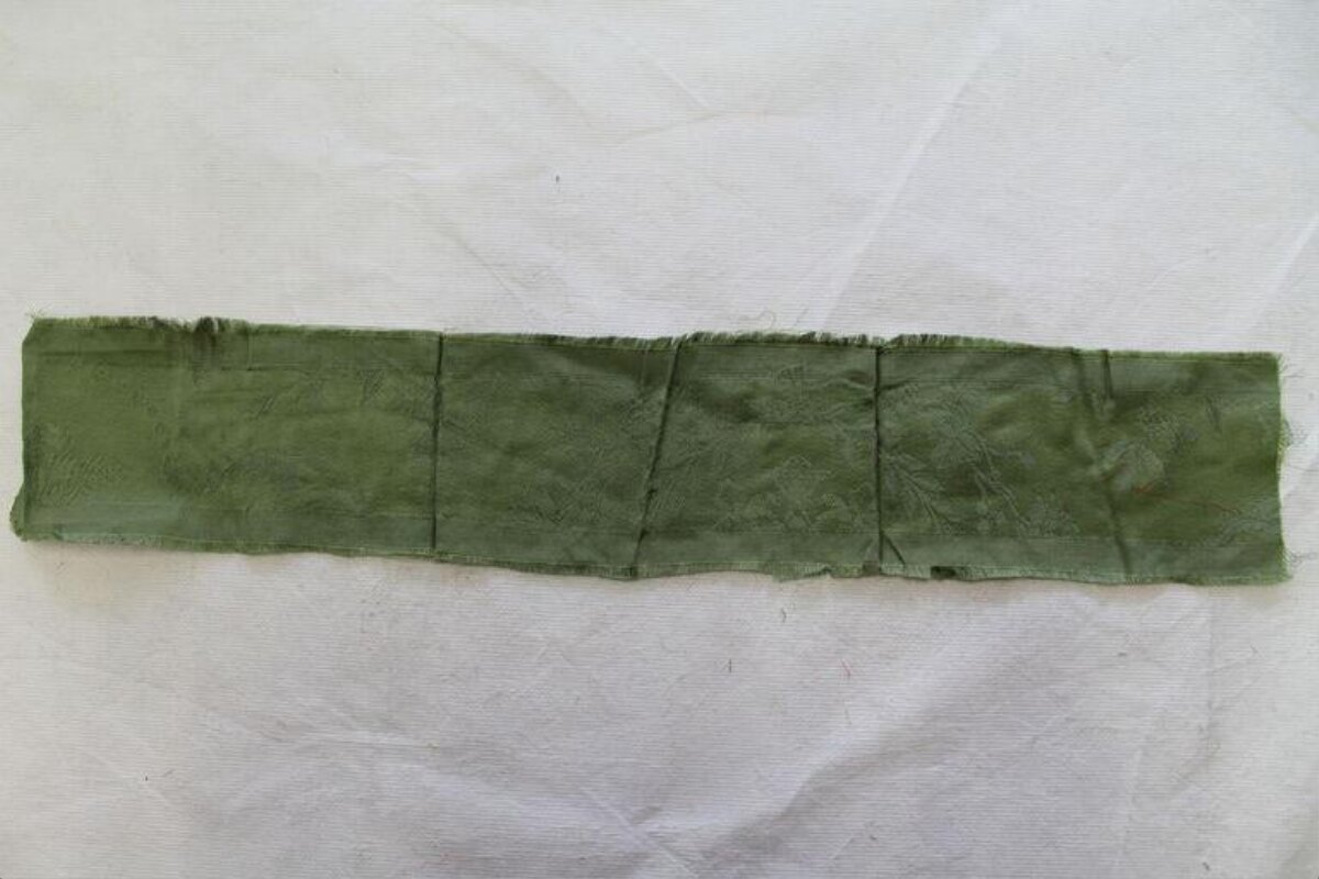 Green Fabric Strip on White Background