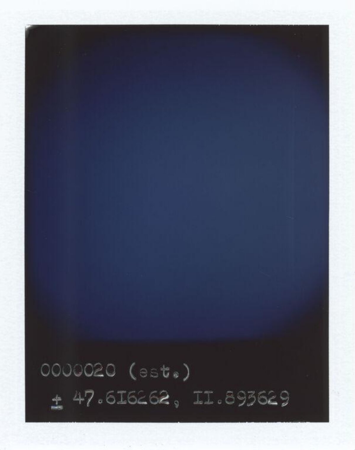 Polaroid With Handwritten Coordinates