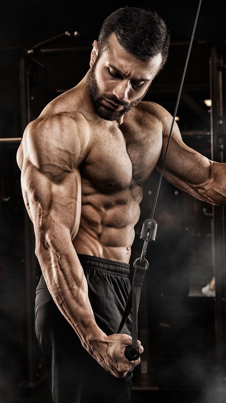 Bodybuilder Training With Cable Machine