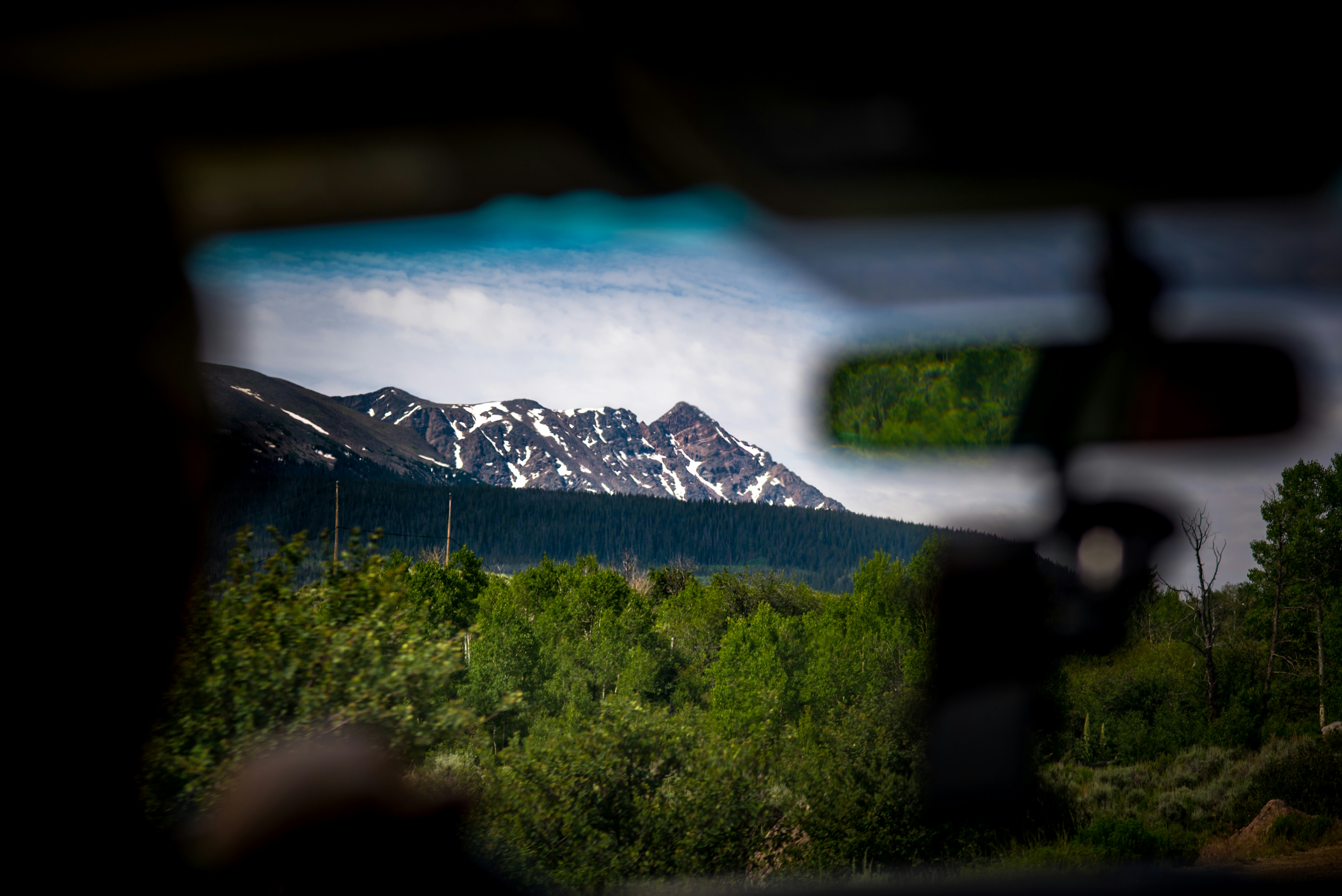 Snowy Mountain Peaks View From Car Window