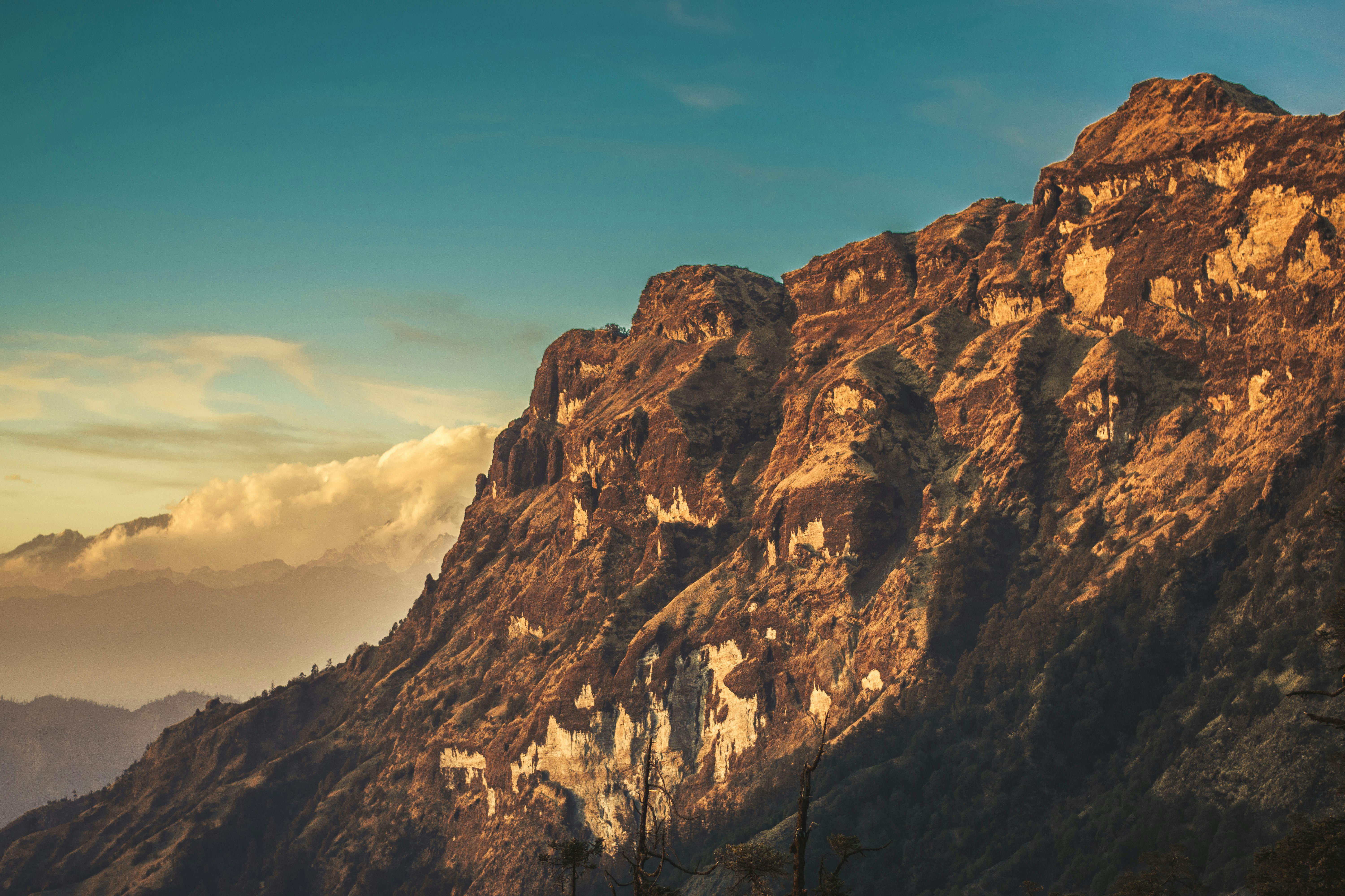 Golden Sunlit Mountain Range